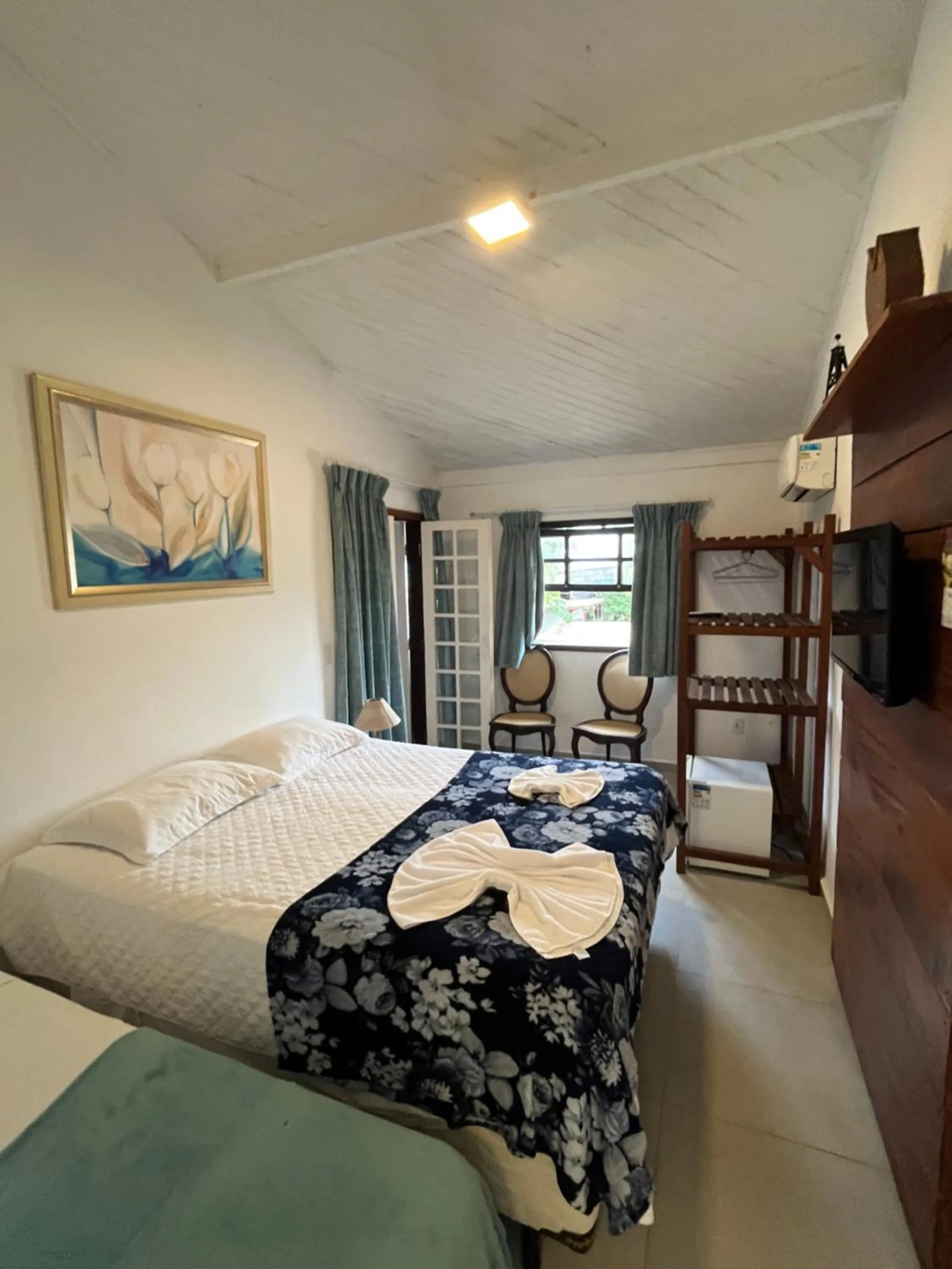 Bed in Pousada Tô na Praia Juquehy