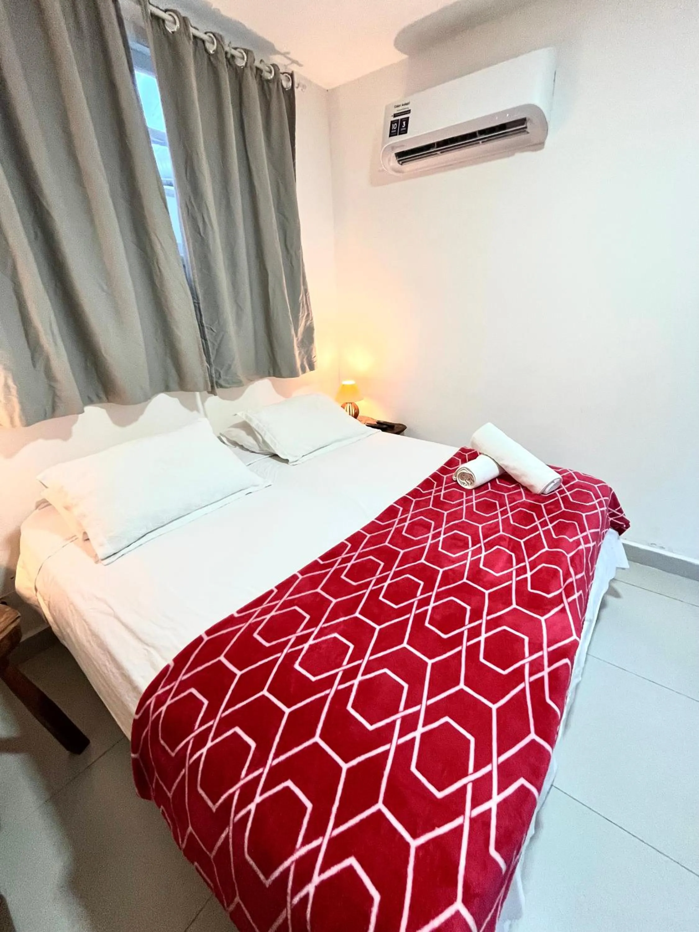 Bed in Pousada Tô na Praia Juquehy