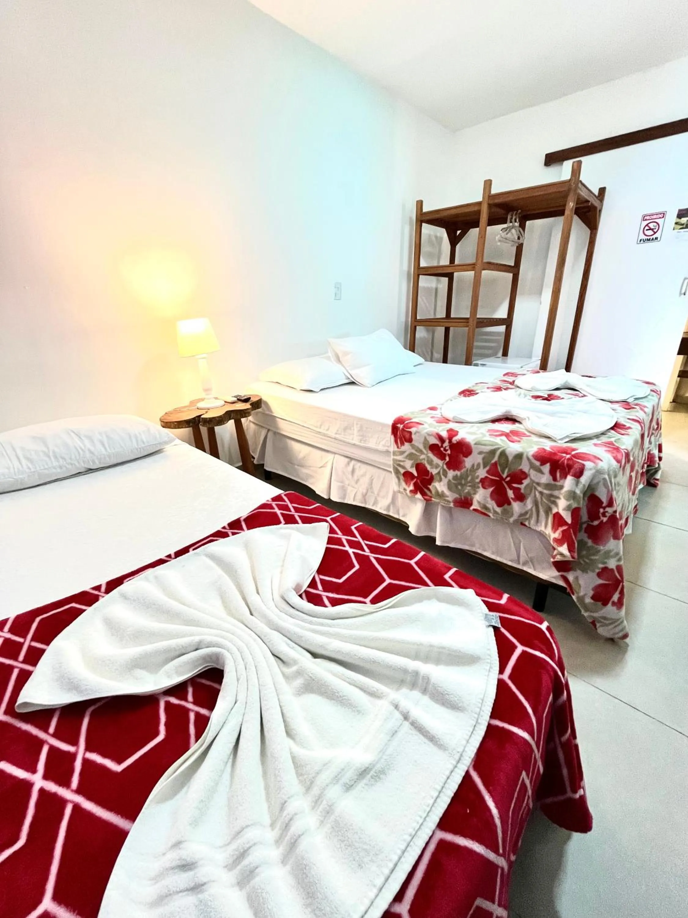 Bed in Pousada Tô na Praia Juquehy