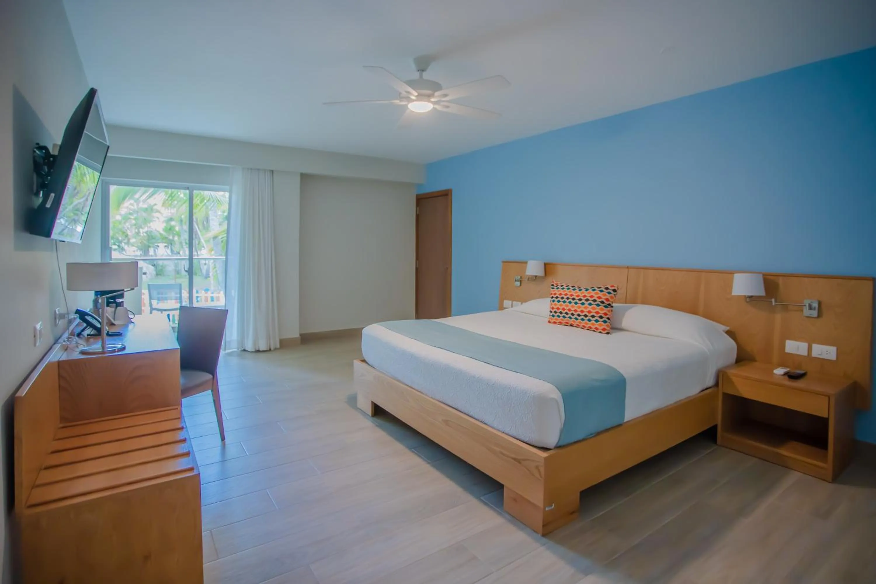 Bed in Coral Costa Caribe Beach Resort - All Inclusive