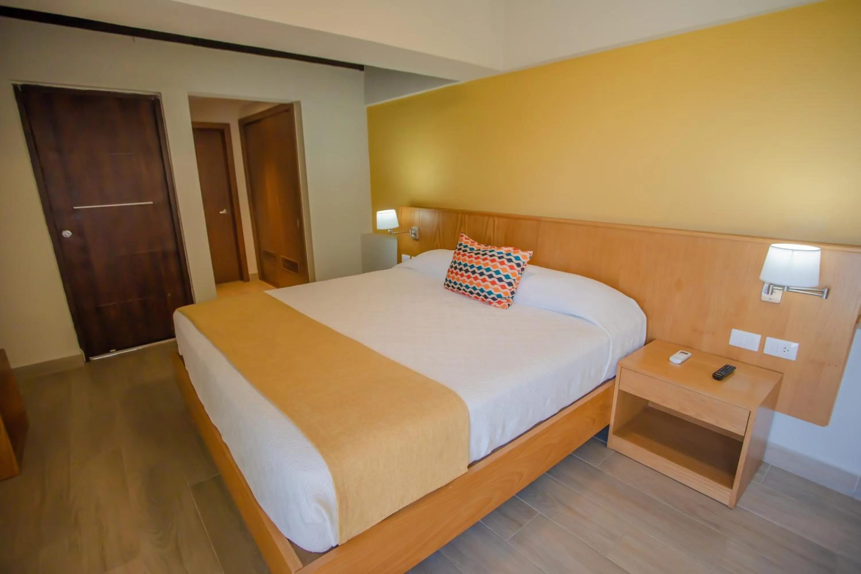 Bed in Coral Costa Caribe Beach Resort - All Inclusive