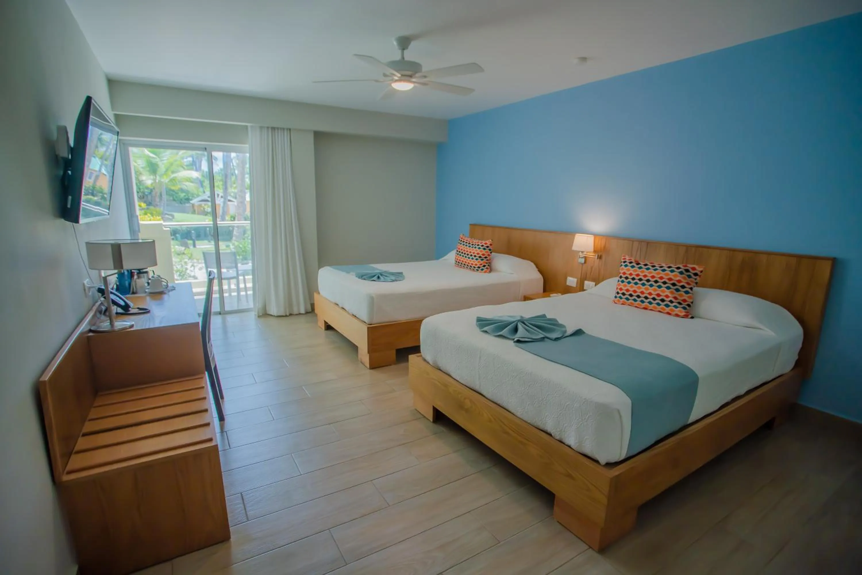 Bed in Coral Costa Caribe Beach Resort - All Inclusive