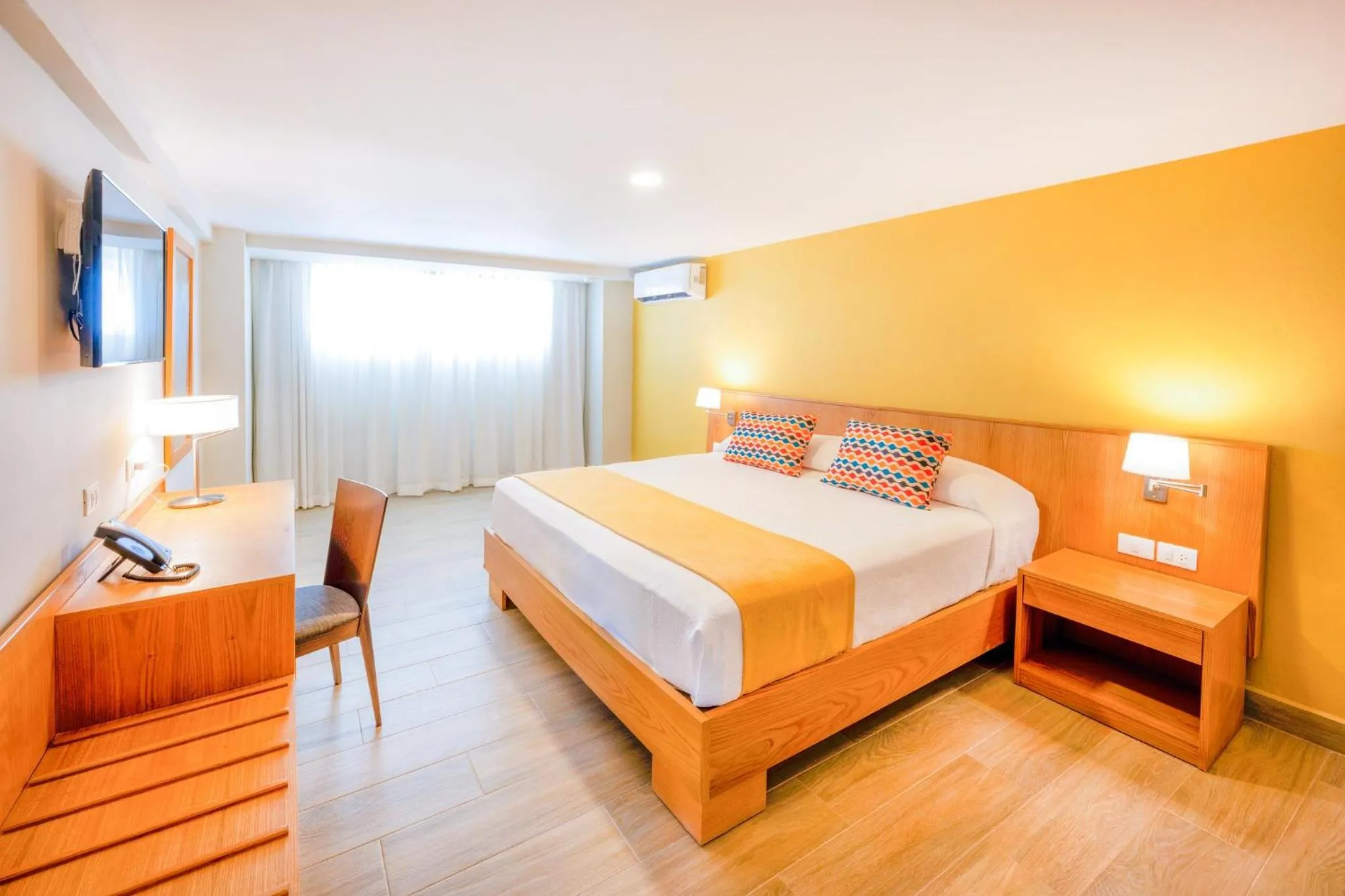 Bed in Coral Costa Caribe Beach Resort - All Inclusive