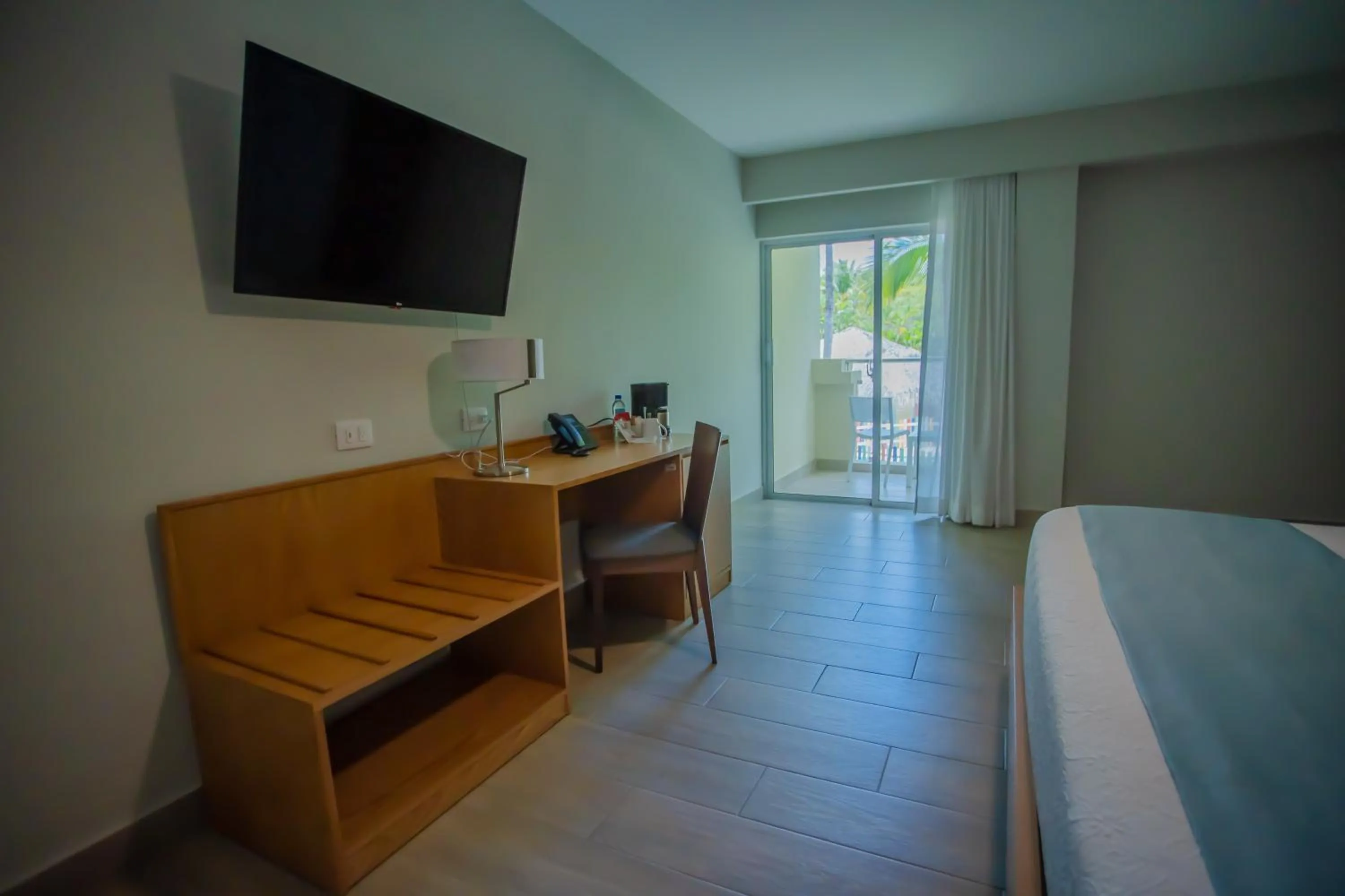 Bed in Coral Costa Caribe Beach Resort - All Inclusive