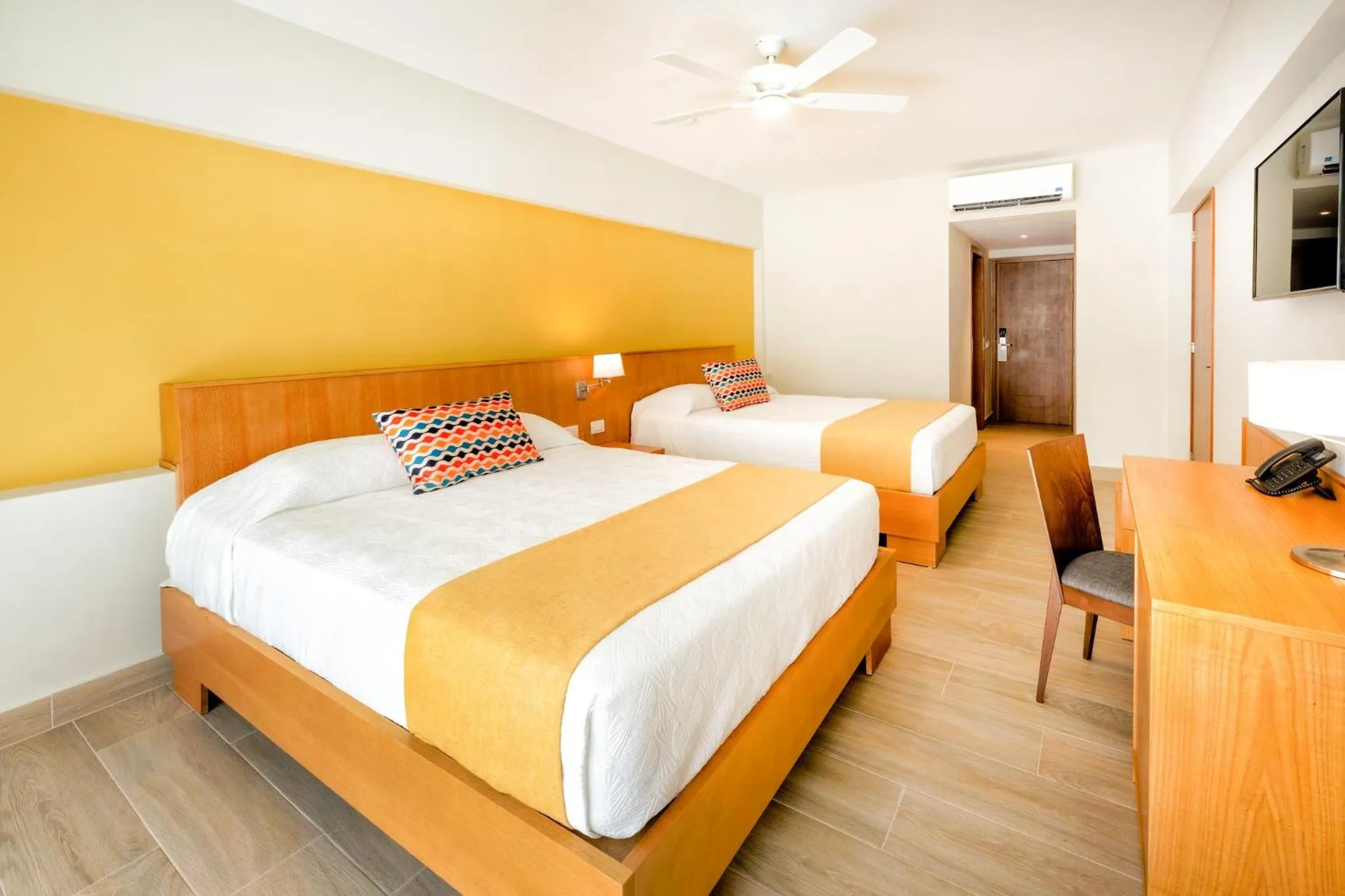 Bed in Coral Costa Caribe Beach Resort - All Inclusive