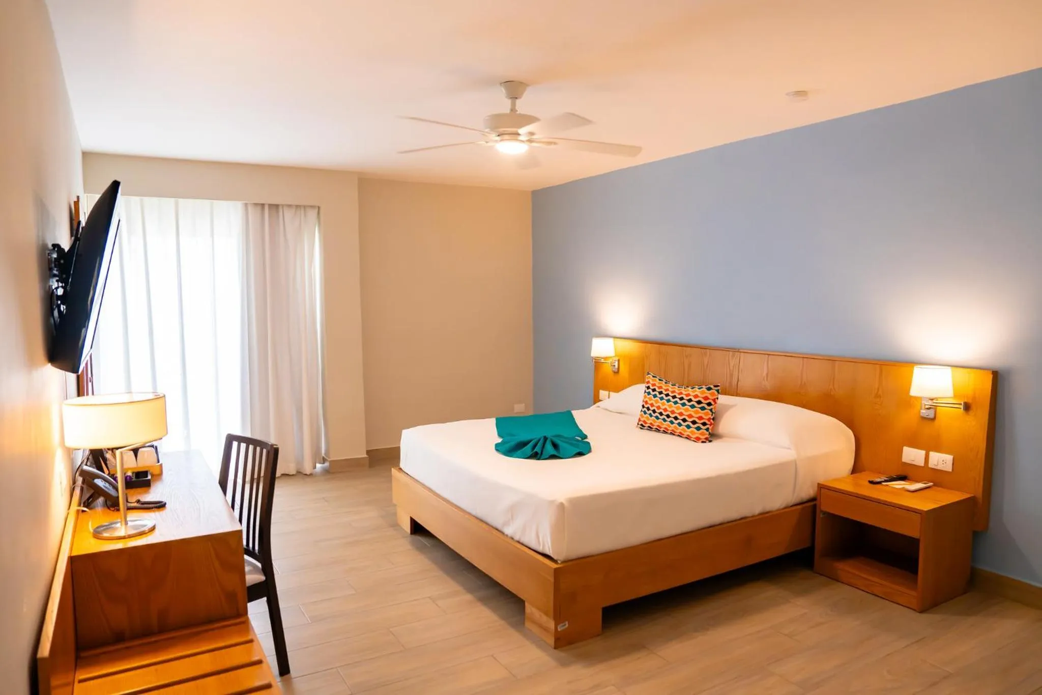 Bedroom, Bed in Coral Costa Caribe Beach Resort - All Inclusive