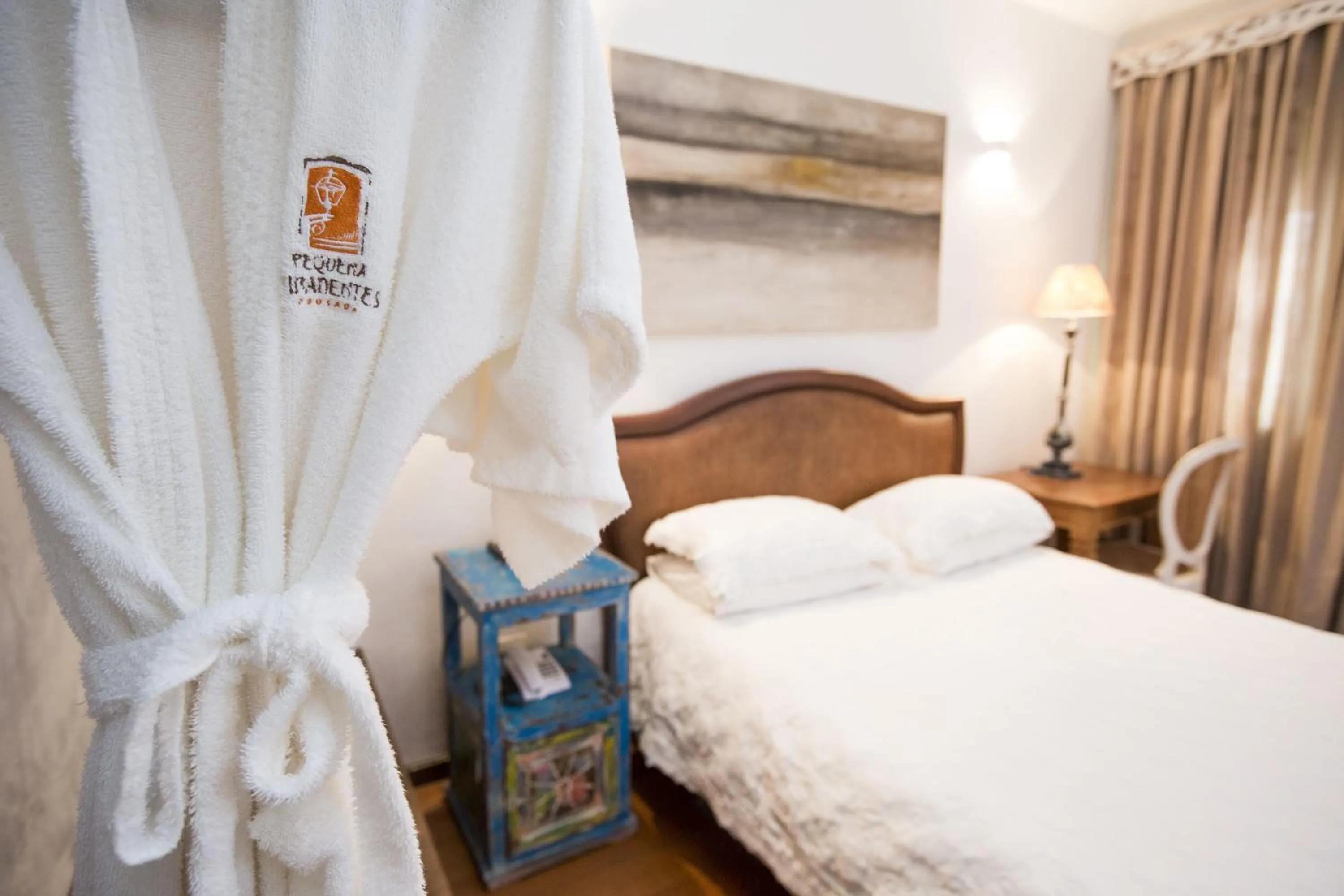 Bed in Pousada Pequena Tiradentes