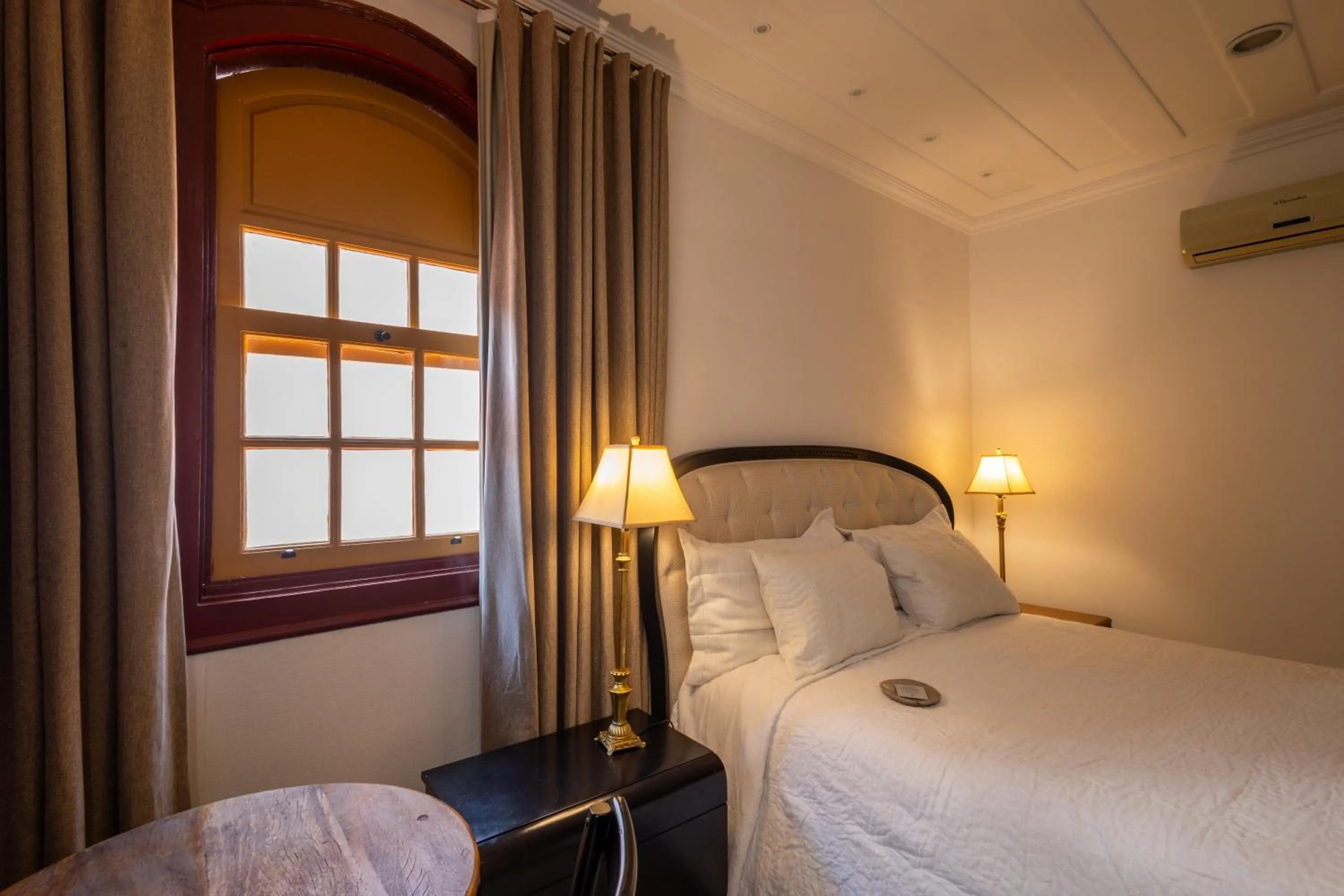 Bed in Pousada Pequena Tiradentes