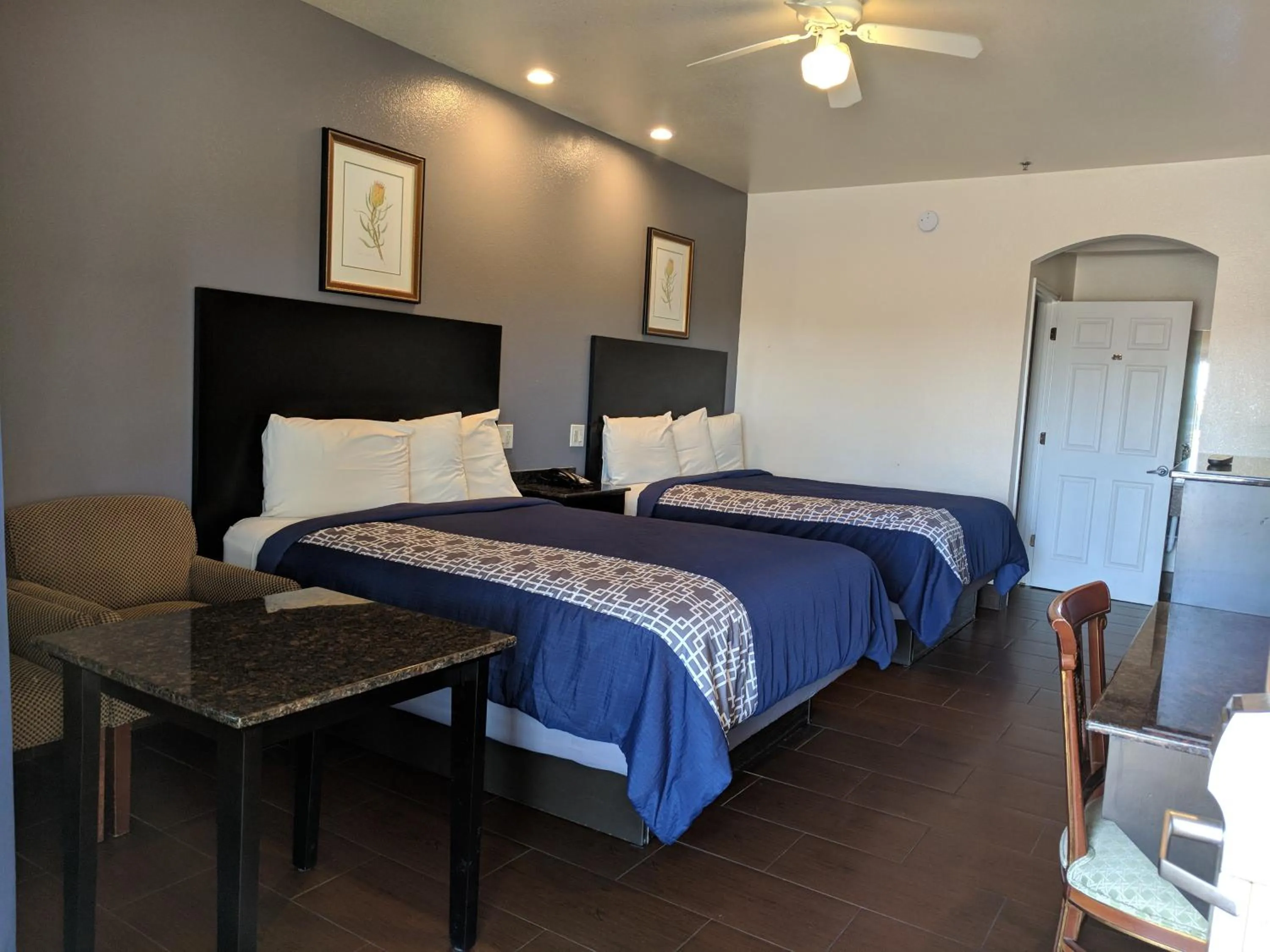 Bedroom, Bed in Americas Best Value Inn - Brownsville