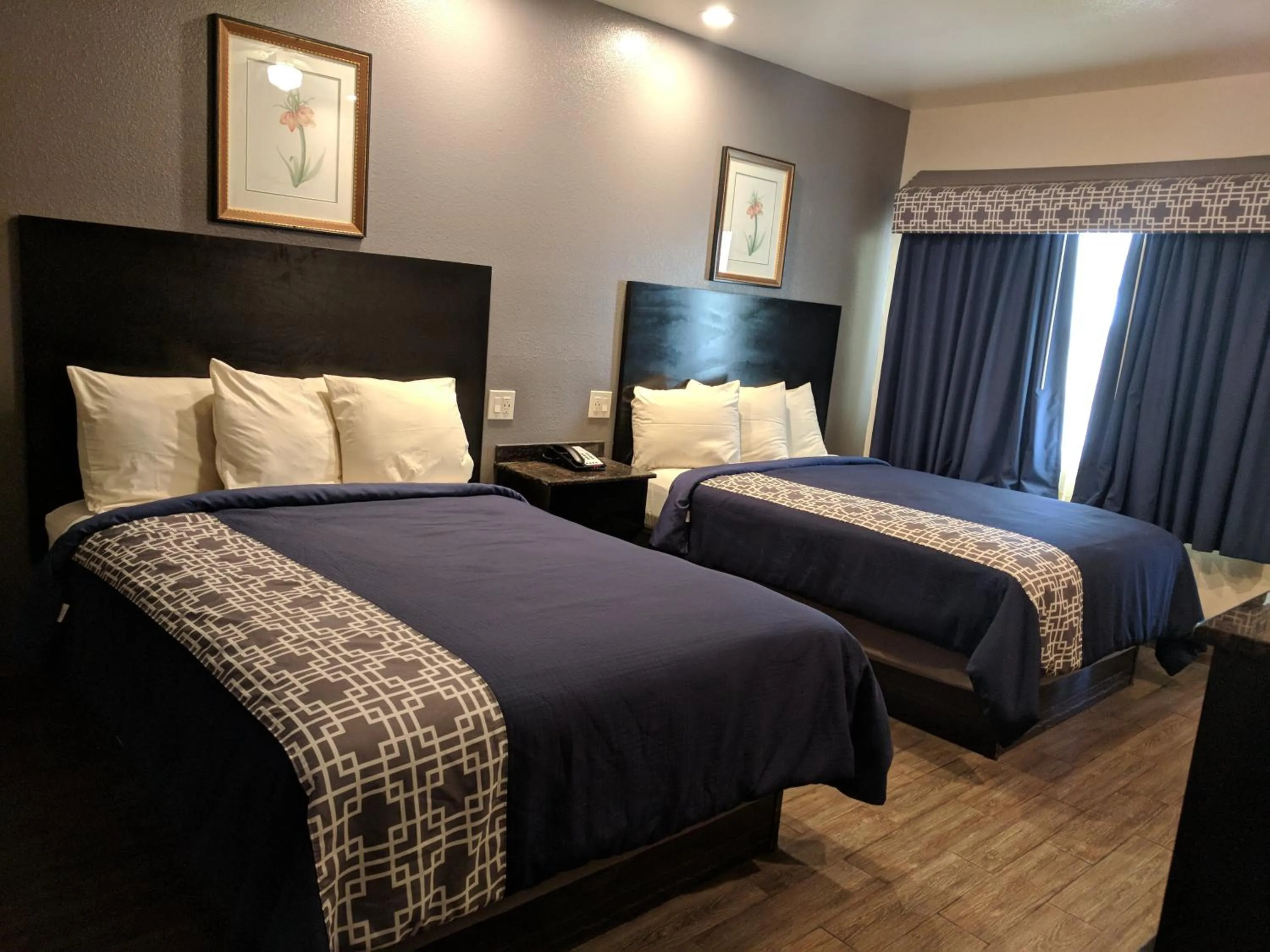 Bedroom, Bed in Americas Best Value Inn - Brownsville