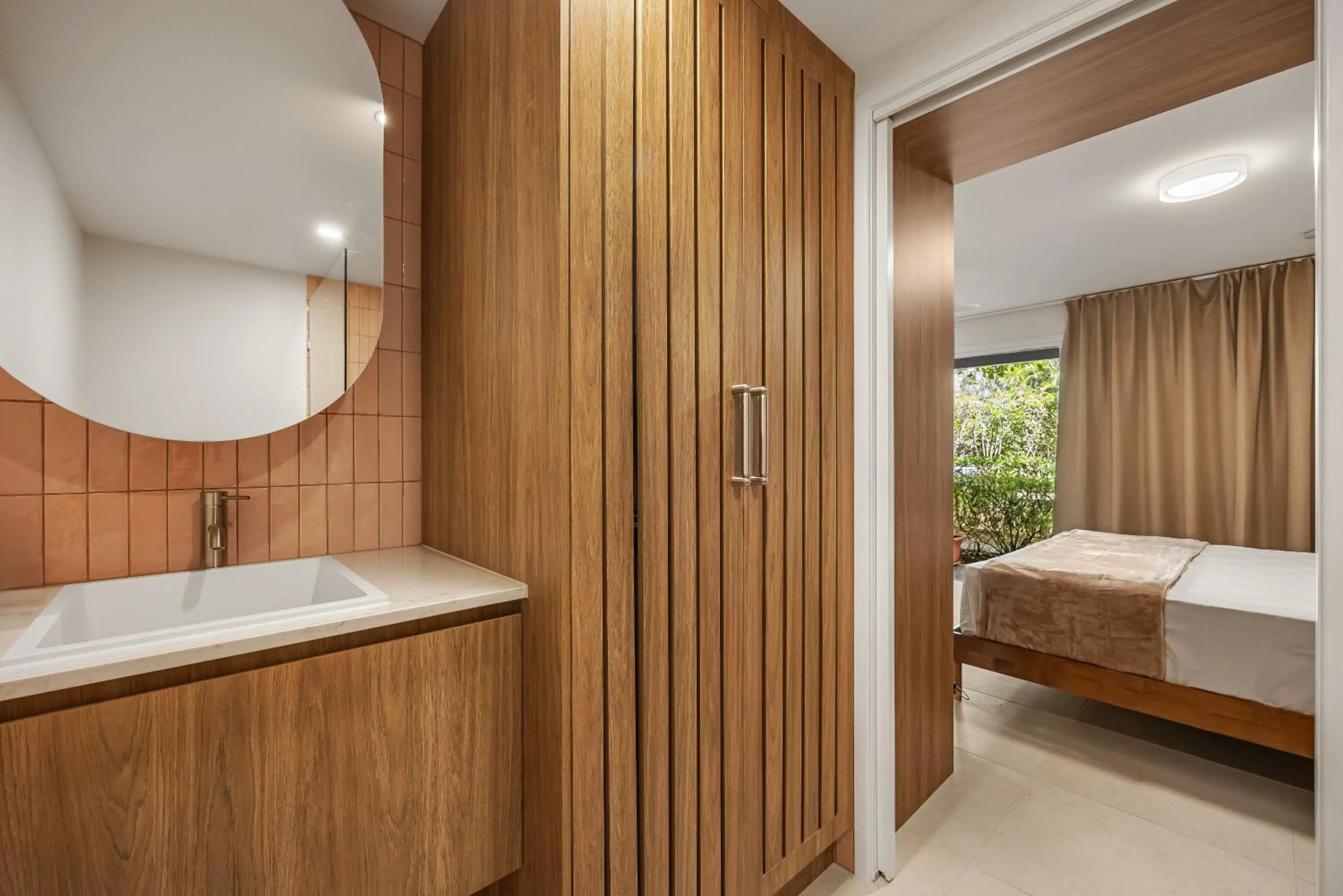 Bed in Noosa Outrigger Beach Resort