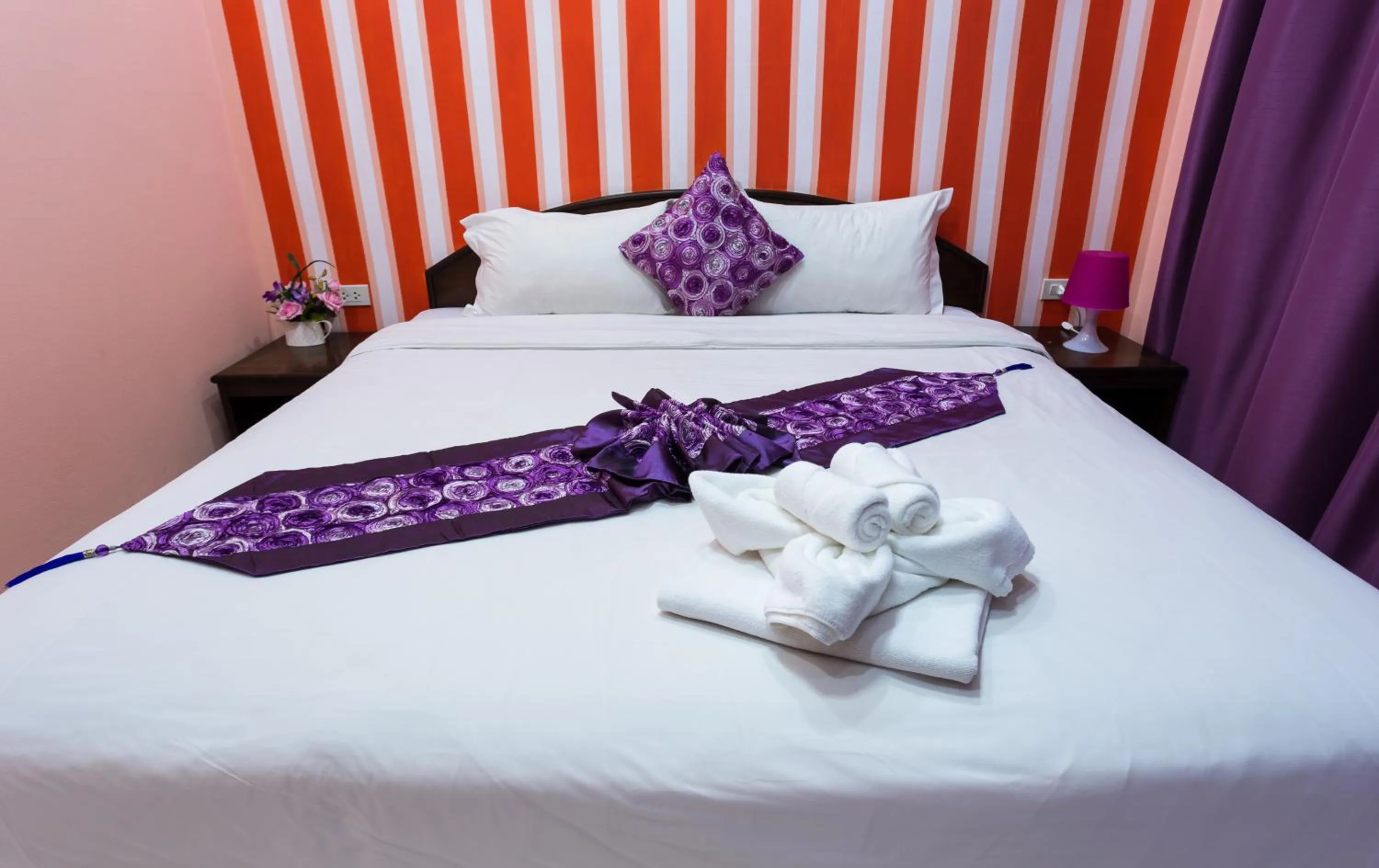 Balcony/Terrace, Bed in Grand Orchid Inn Patong beach