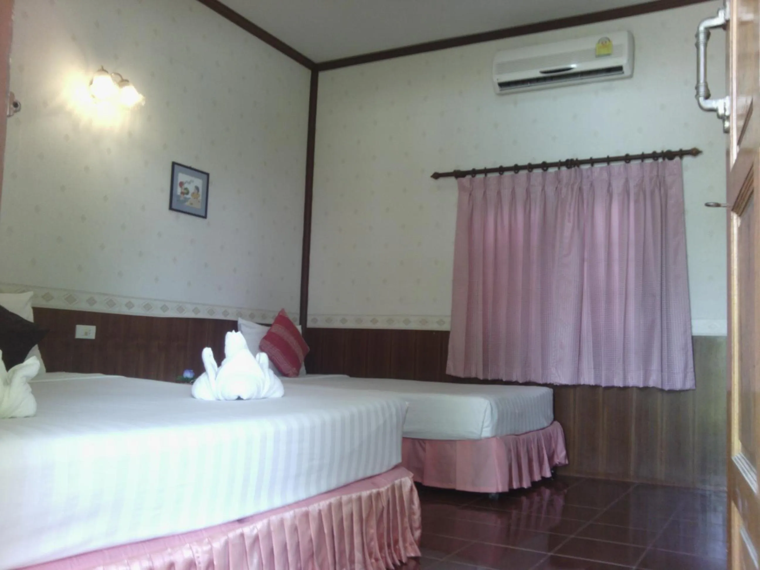 Bed in Rung Arun Resort