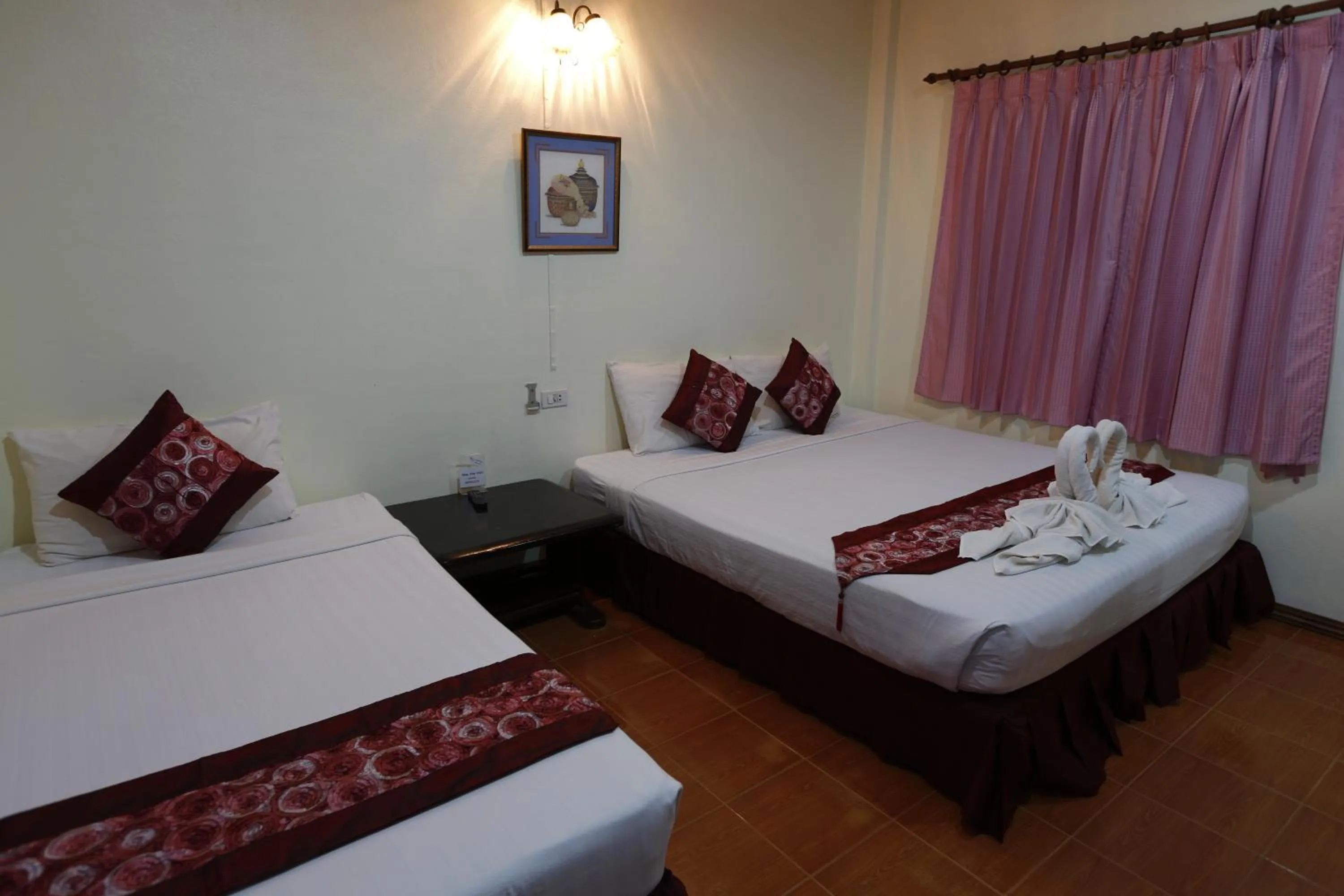 Bed in Rung Arun Resort