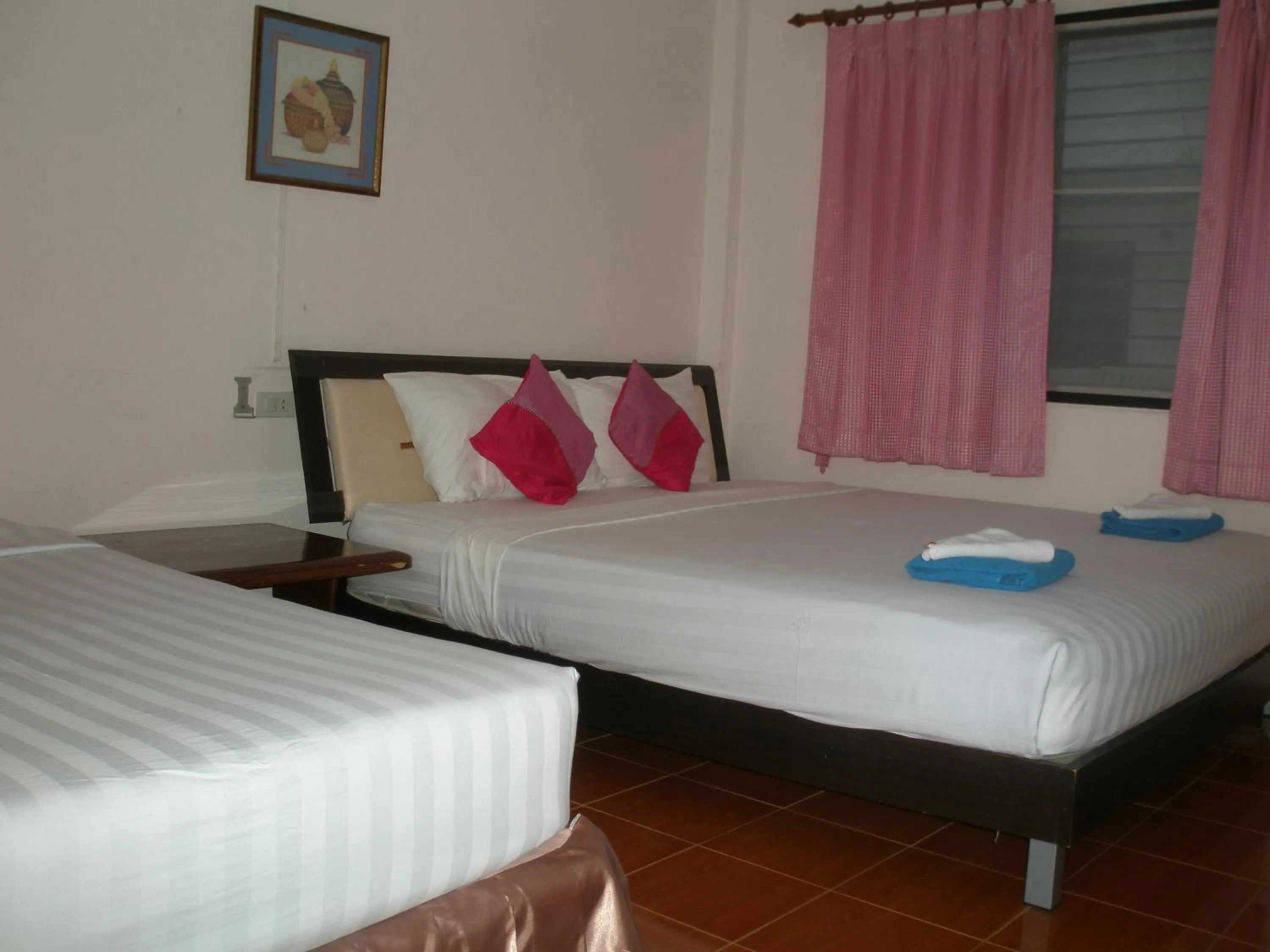 Bed in Rung Arun Resort