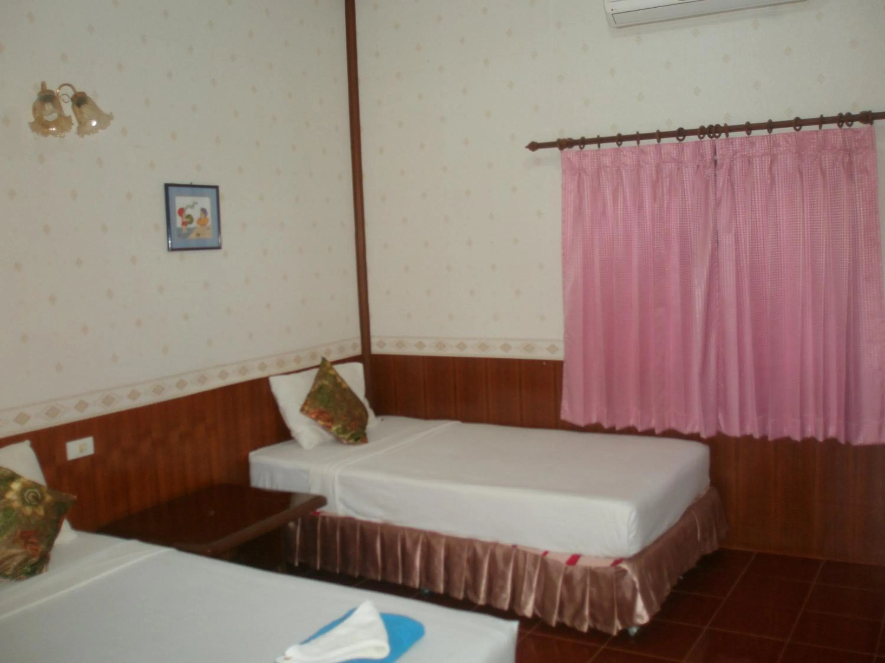 Bed in Rung Arun Resort