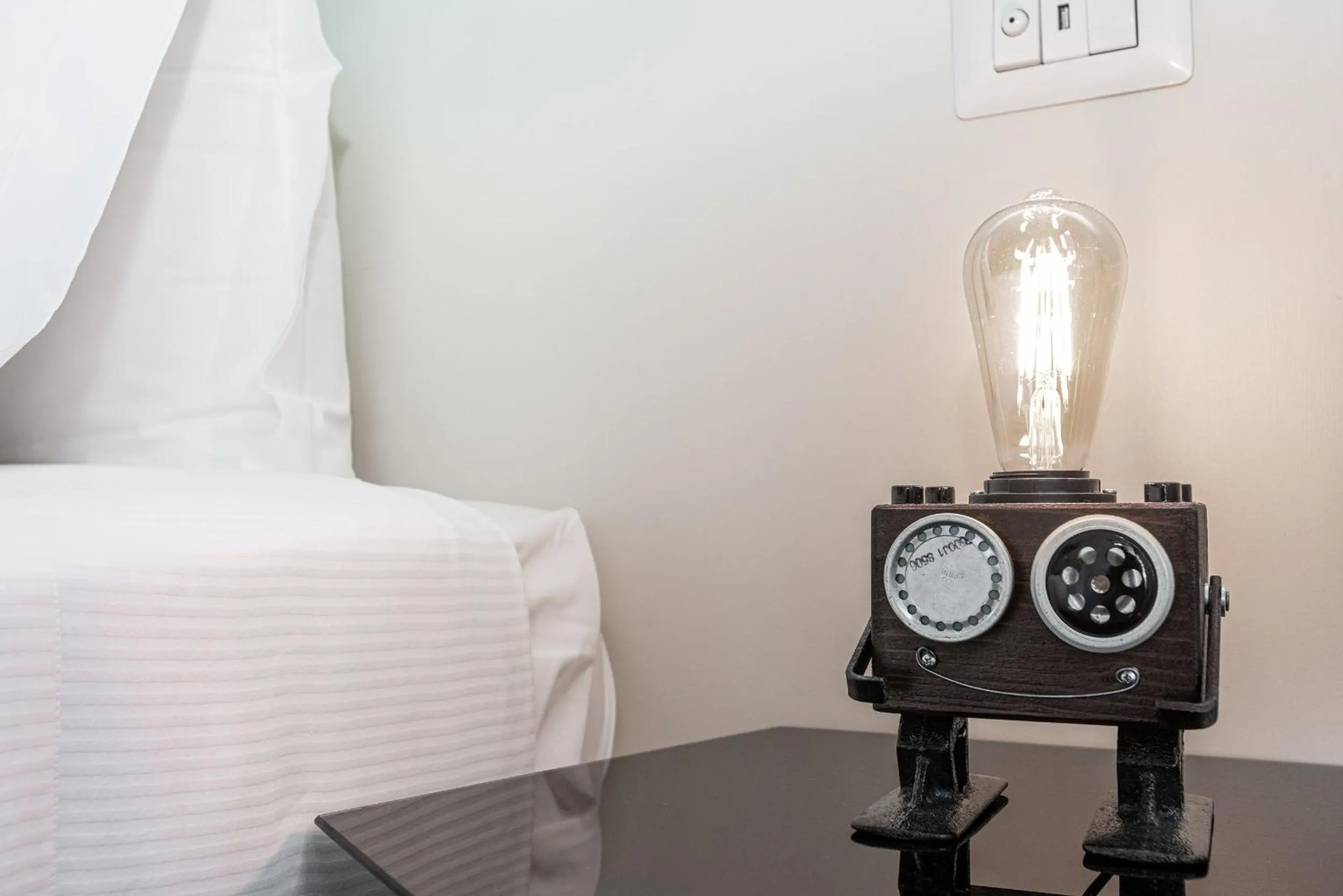 Decorative detail, Bed in Maison Rêve Torino Centro