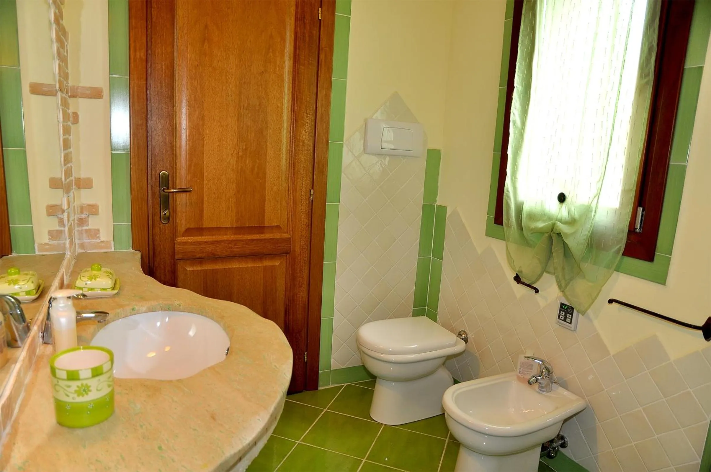 Bathroom in villa i ginepri