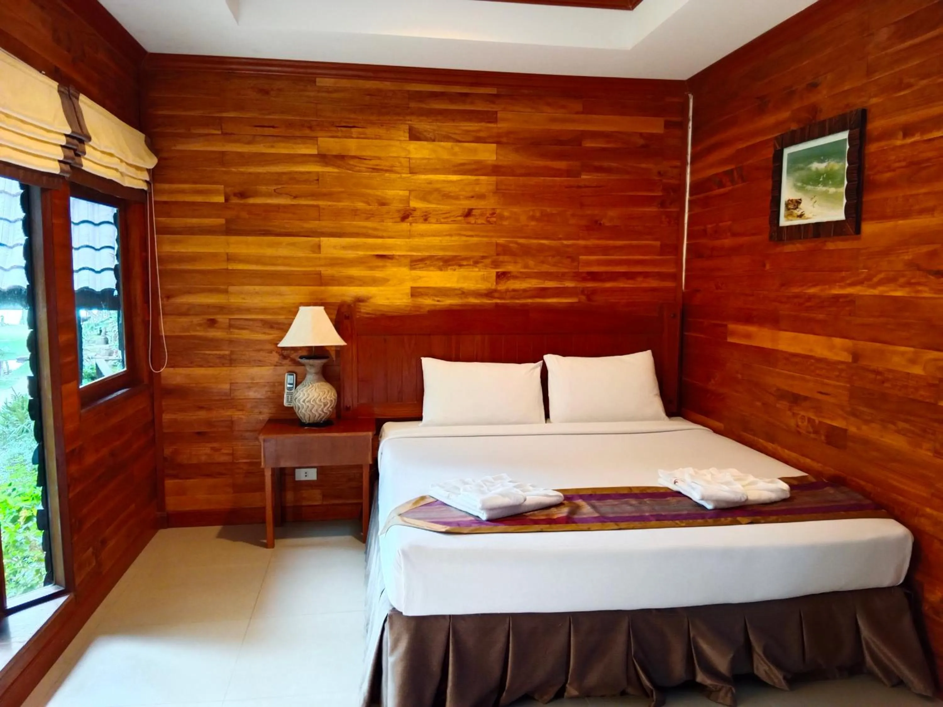 Property building, Bed in Tommy Resort