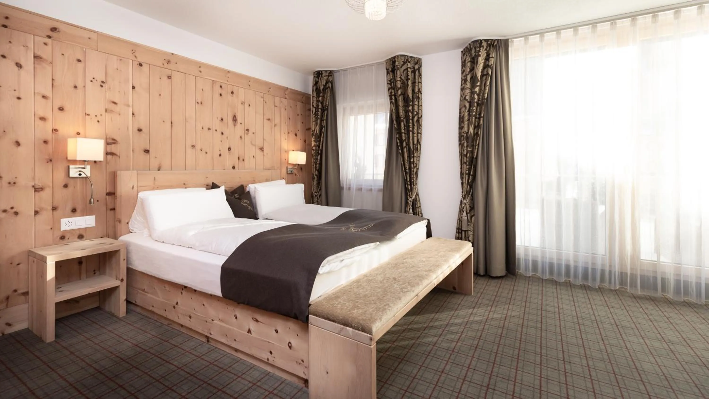 Bed in Hotel Baer & Post Zernez