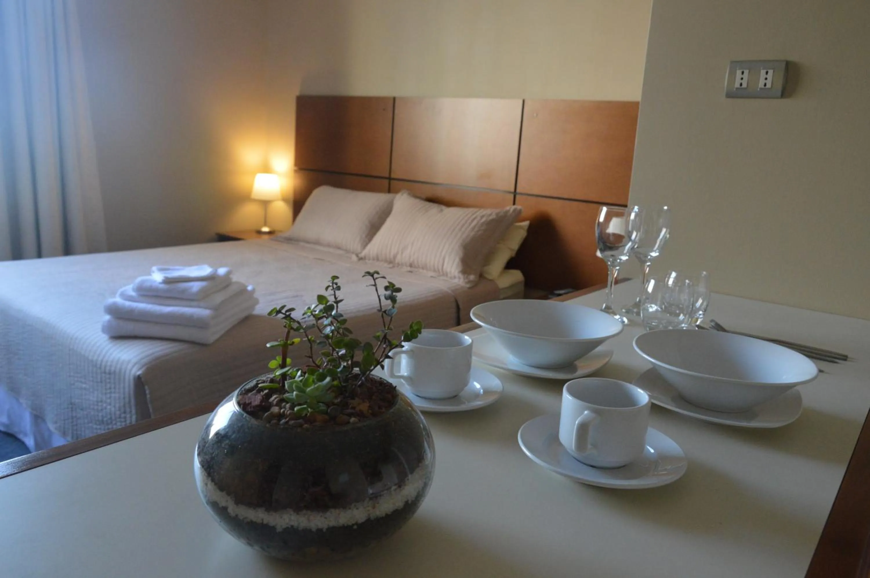Bed in Origen Apart-Hotel