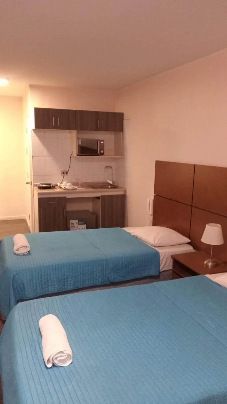 Bed in Origen Apart-Hotel