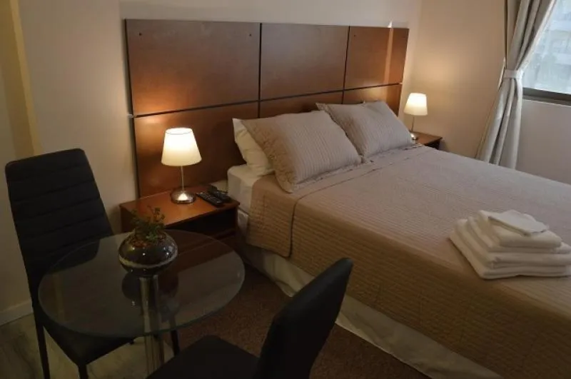 Bed in Origen Apart-Hotel