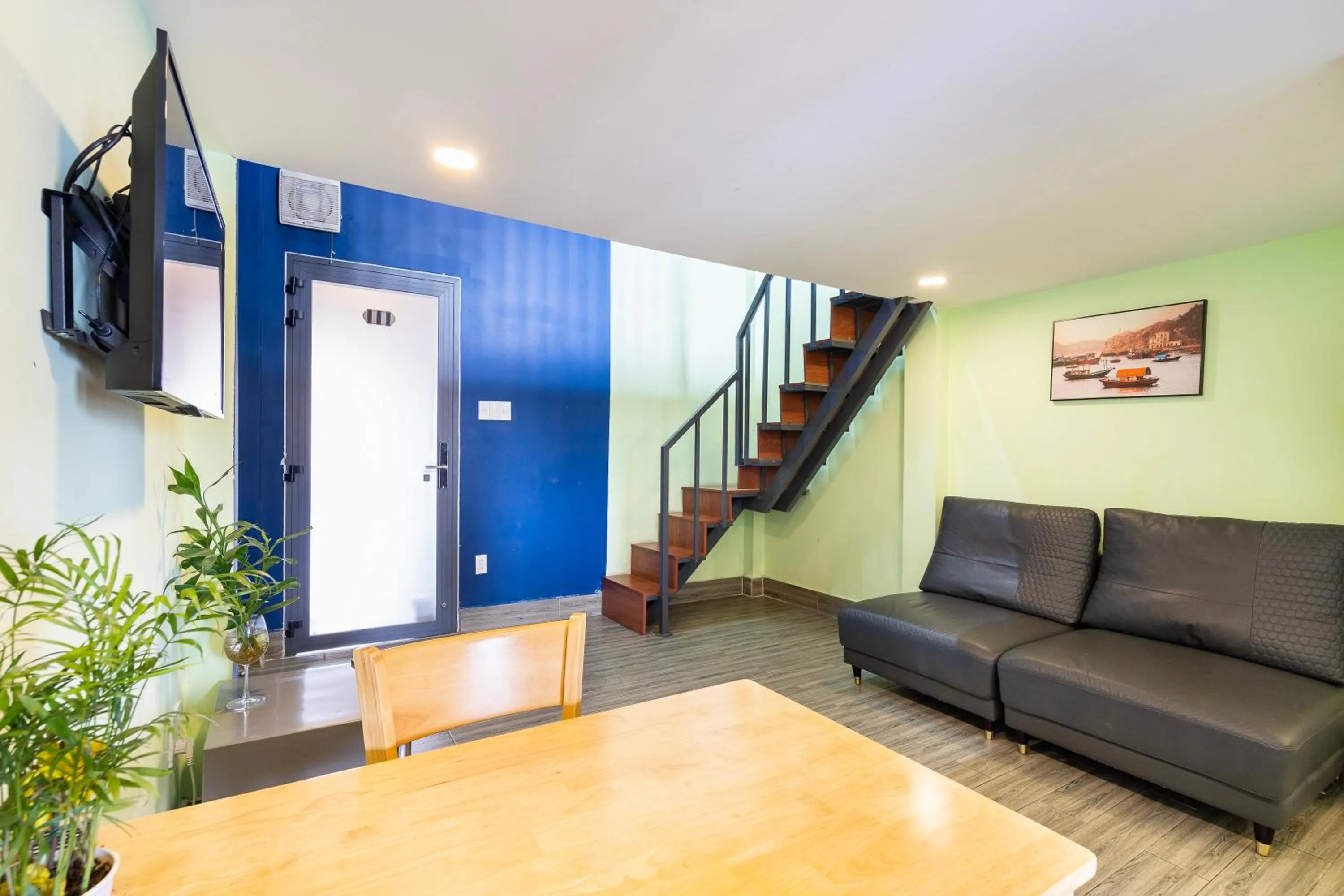 Living room in Gemini Saigon CENTER - New & Quiet near Bui Vien Walking Street