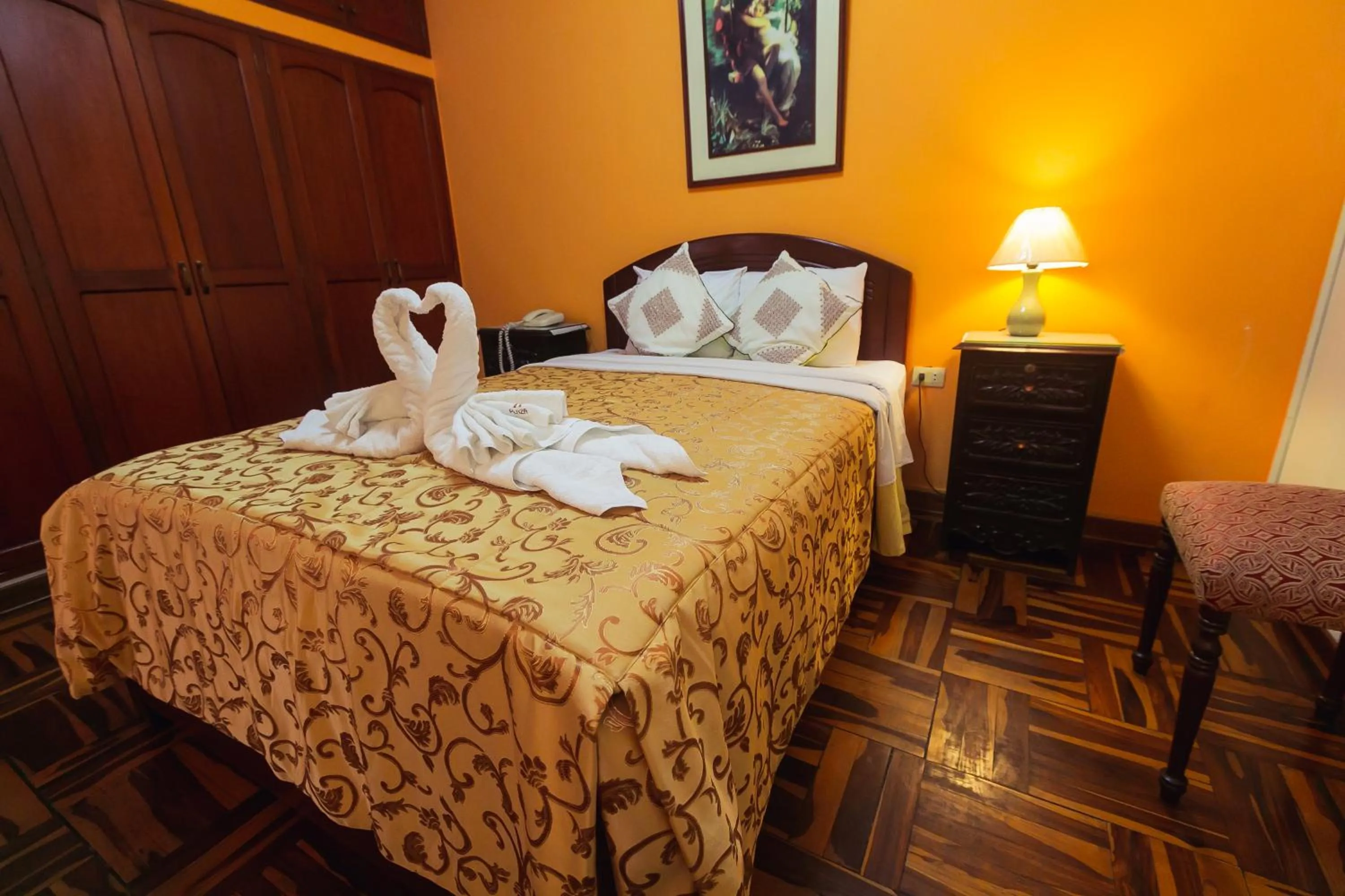 Bed in Hotel Suite Plaza