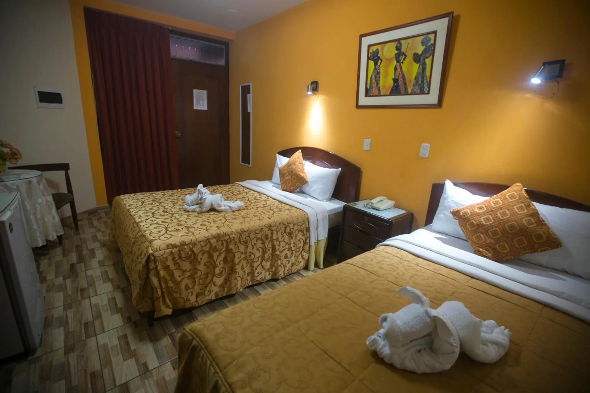 Bed in Hotel Suite Plaza