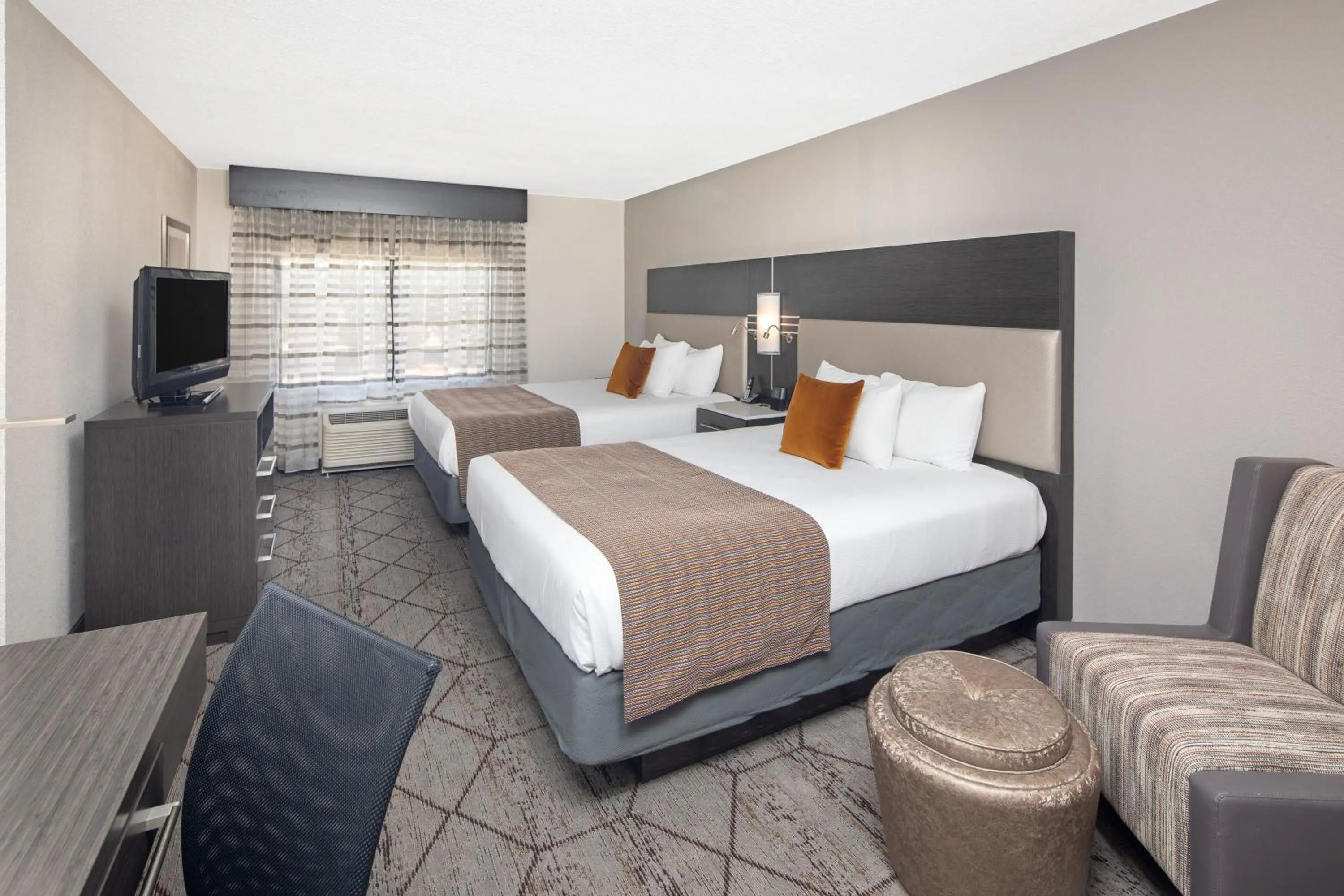 Decorative detail, Bed in Wingate by Wyndham Greenville Airport