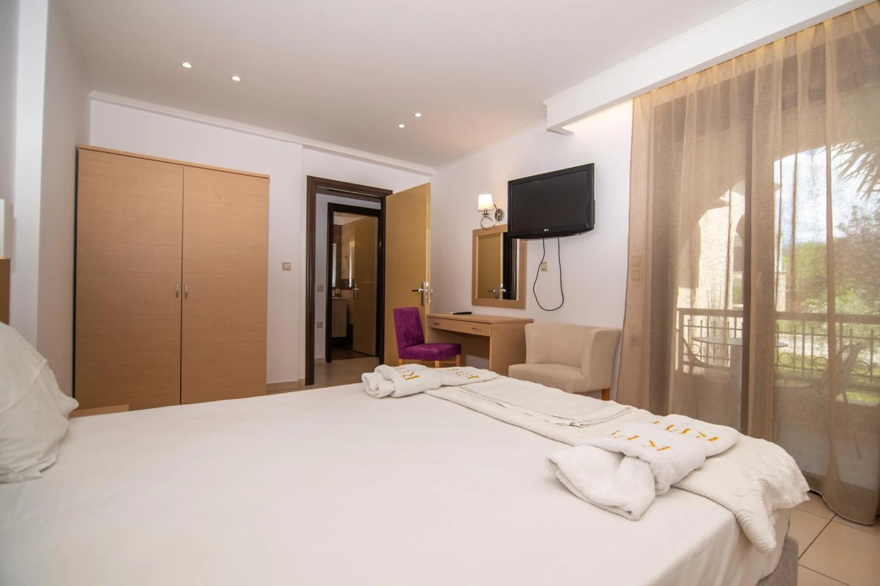 Bed in Riviera Perdika Hotel