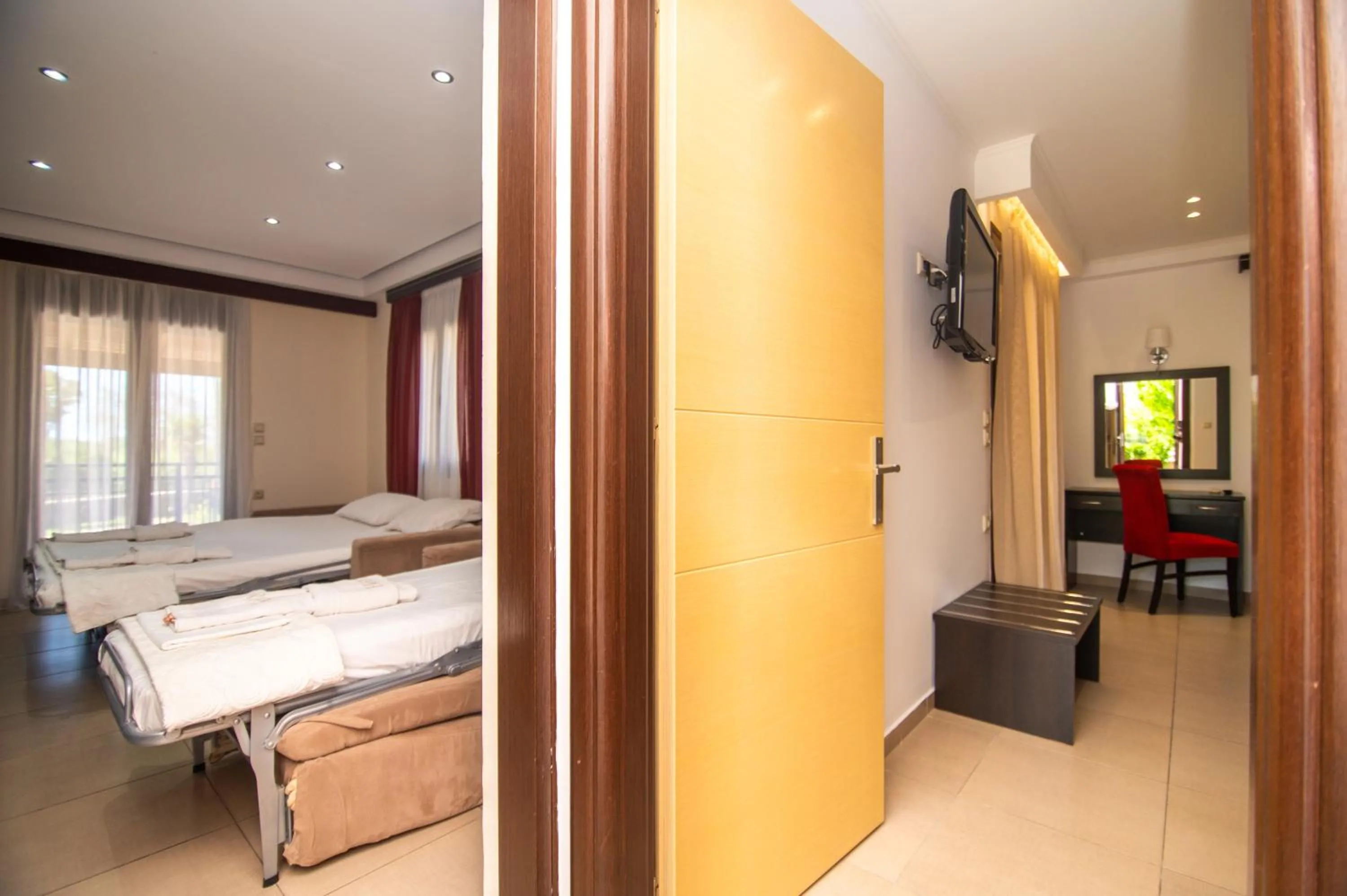 Bed in Riviera Perdika Hotel