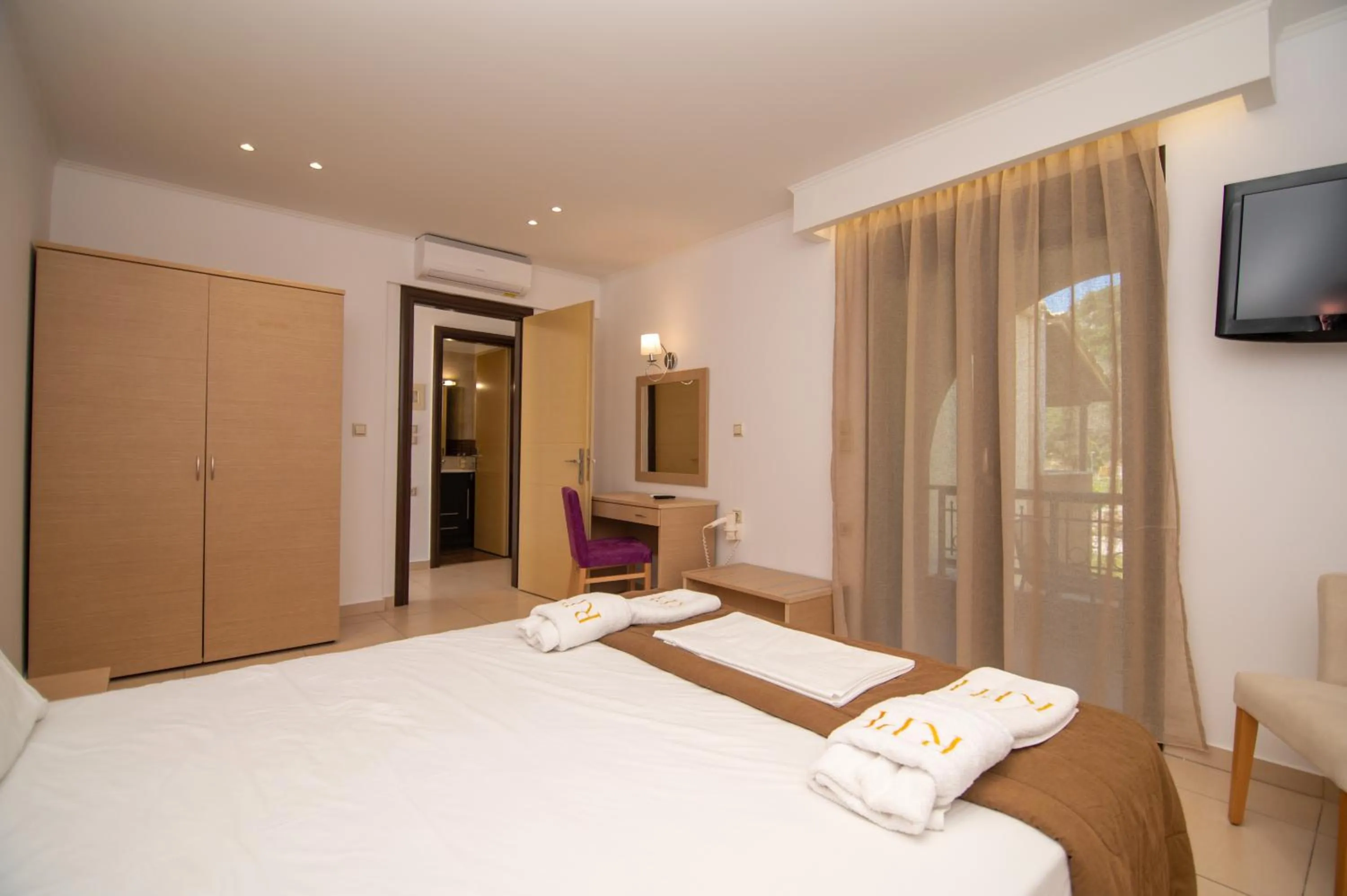 Bed in Riviera Perdika Hotel