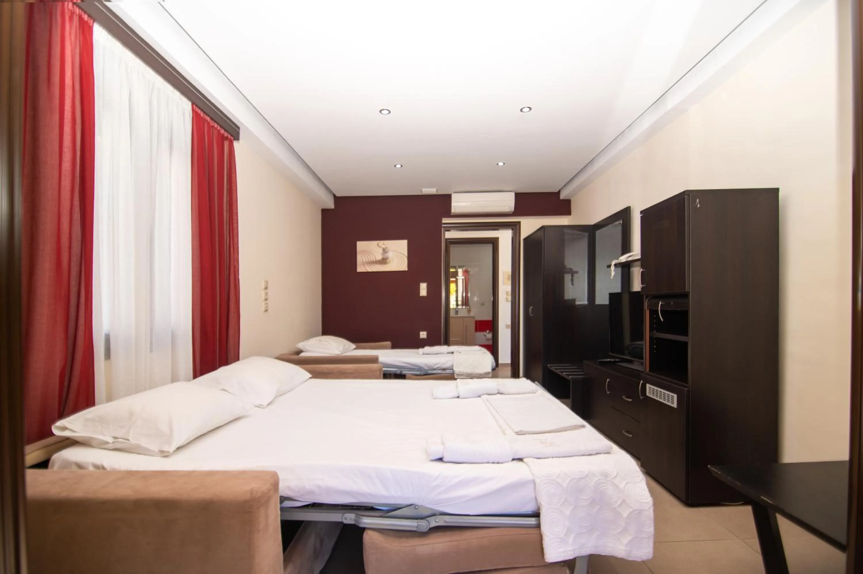 Bed in Riviera Perdika Hotel