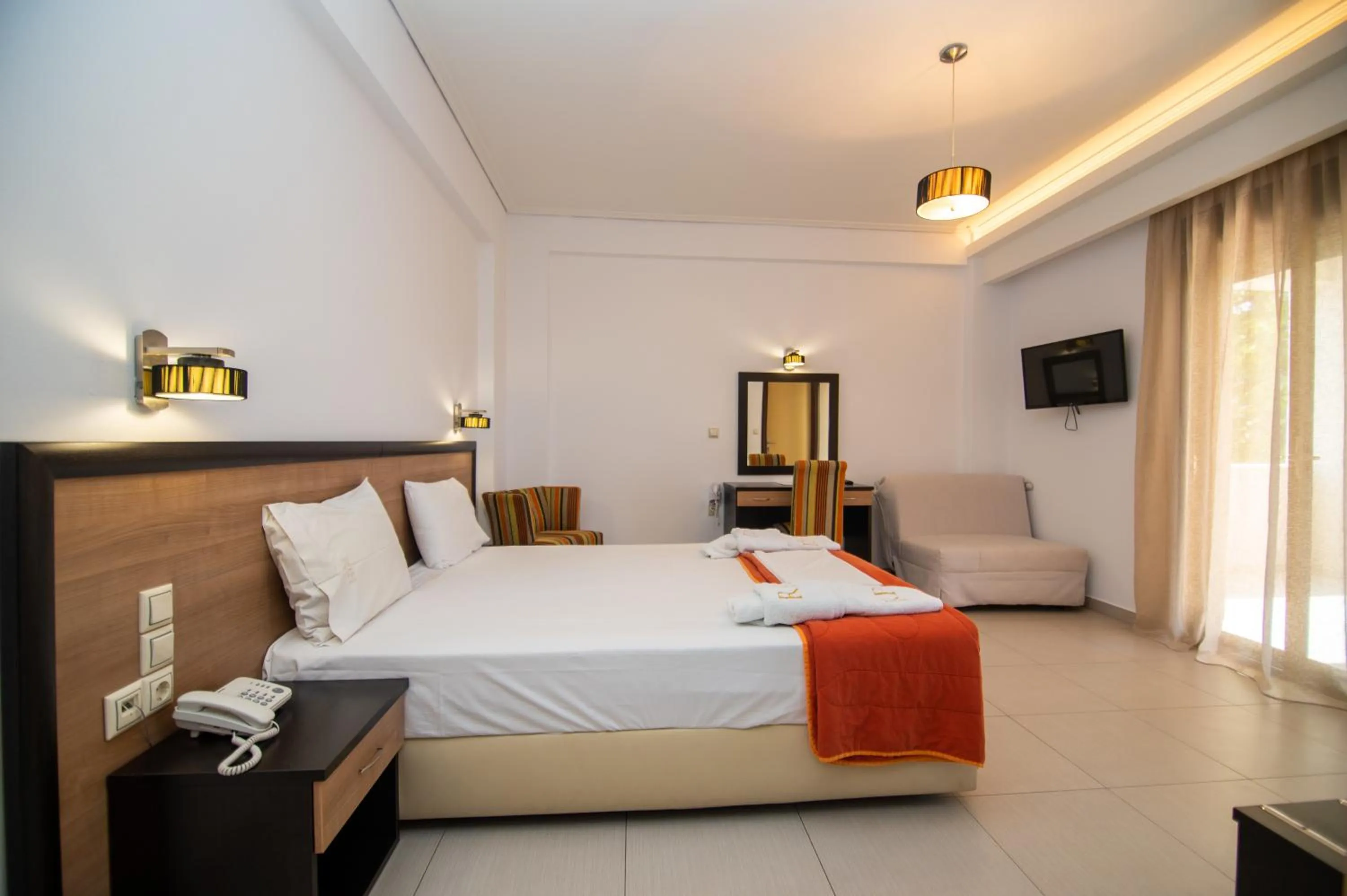 Bed in Riviera Perdika Hotel