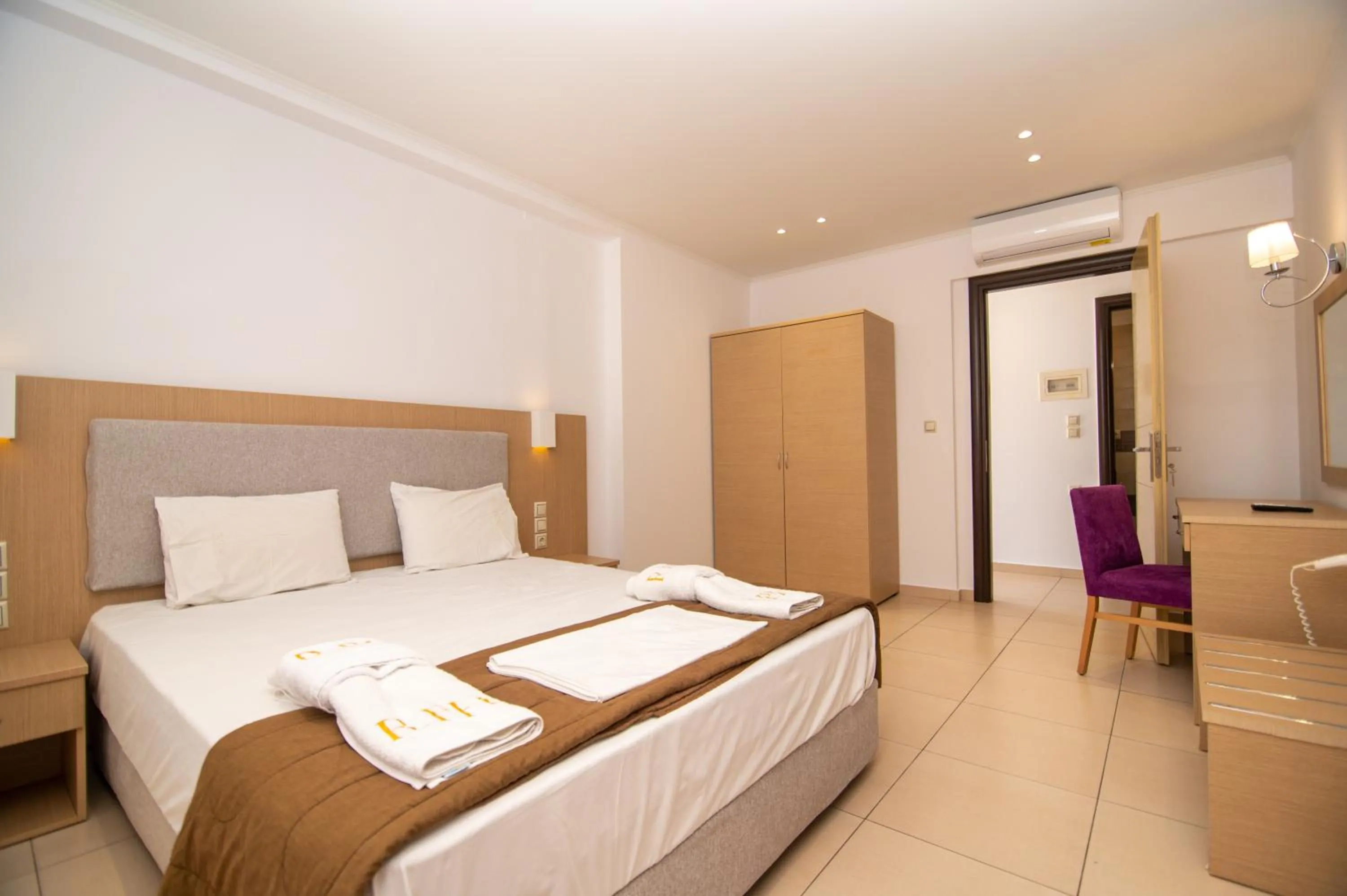 Bed in Riviera Perdika Hotel