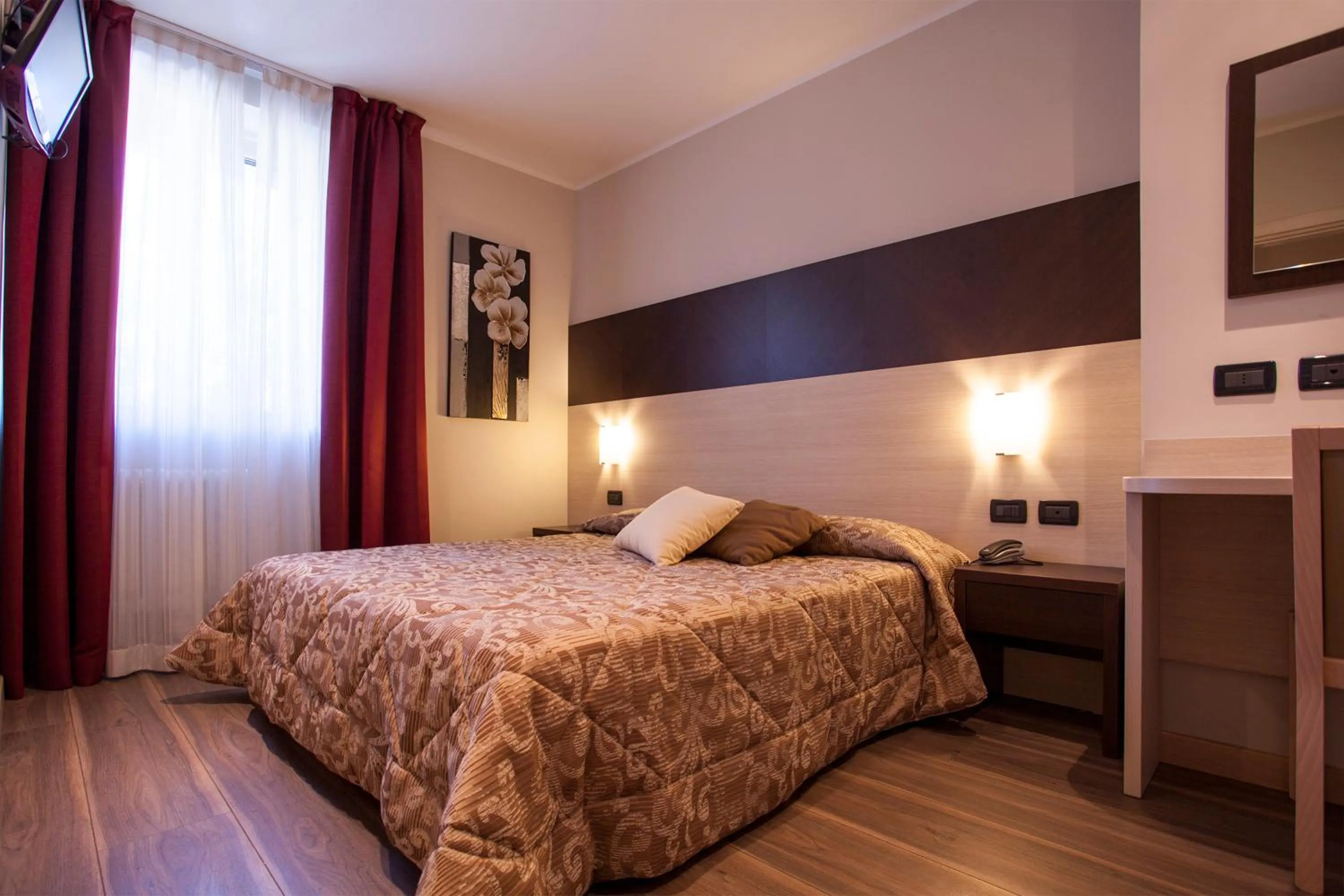 Bed in Hotel Vittoria