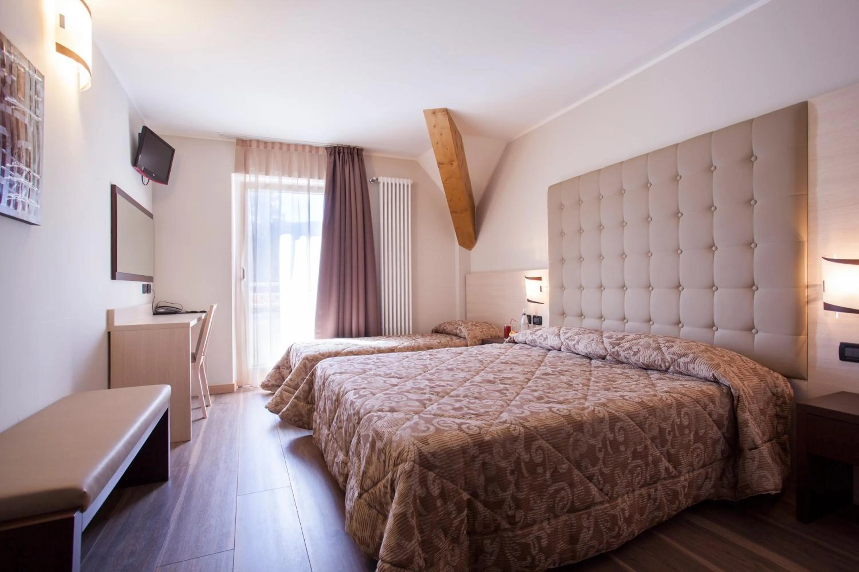 Bed in Hotel Vittoria