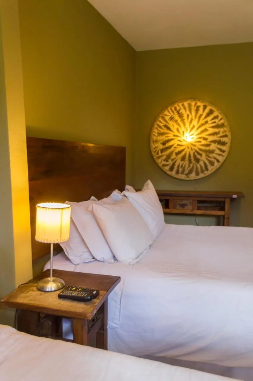 Bed in Pousada Papyrus