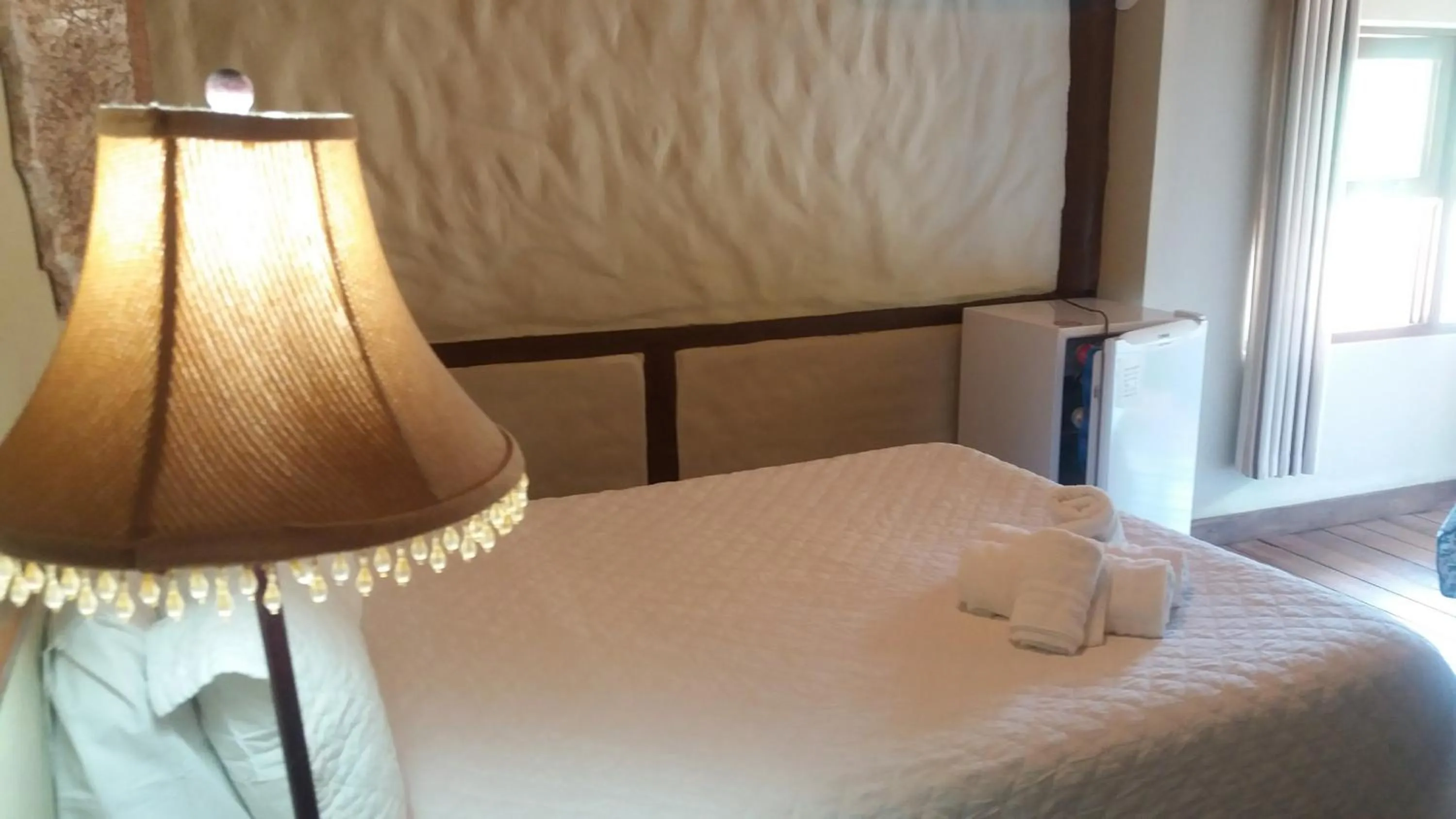 Bed in Pousada Papyrus