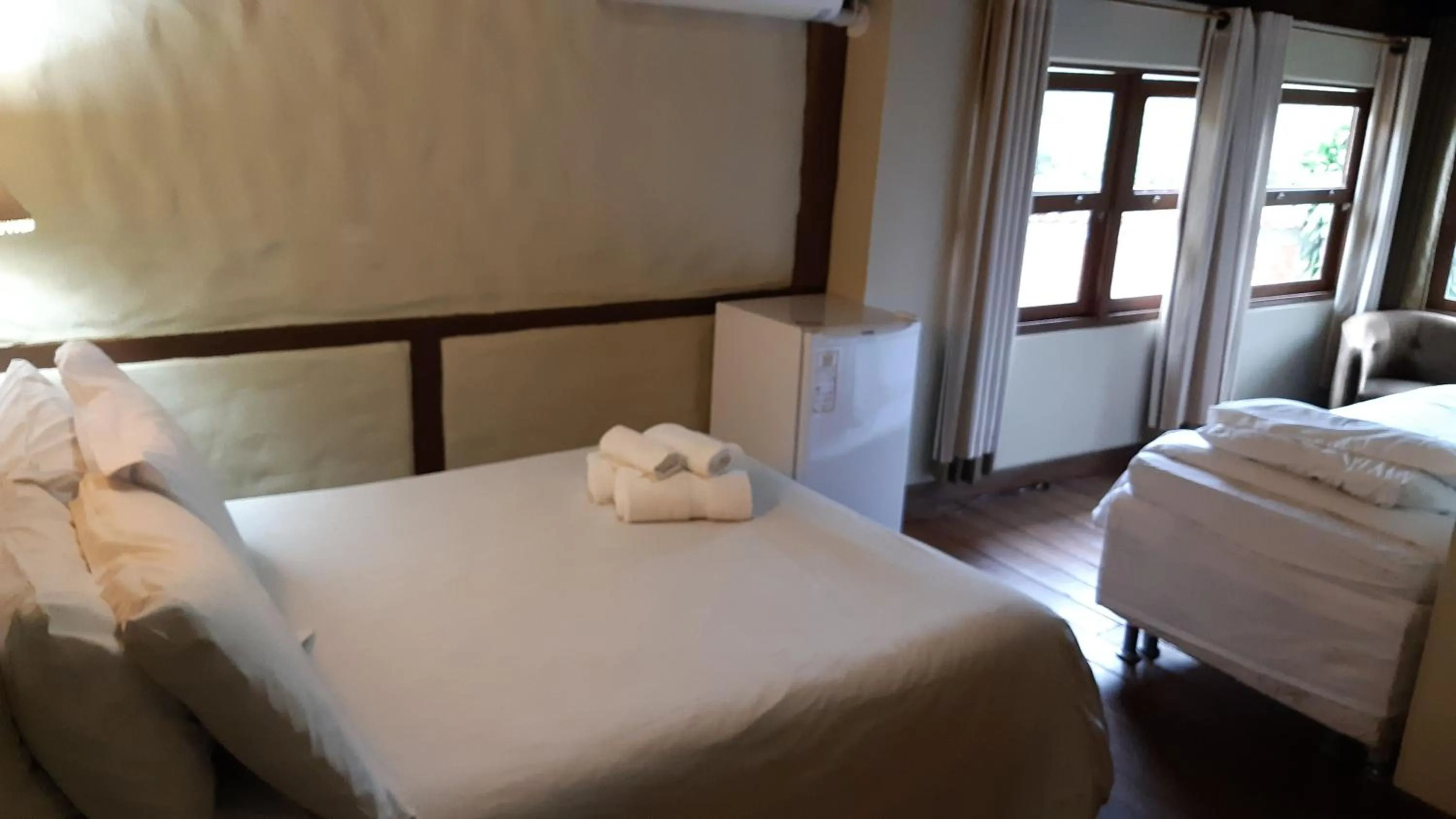 Bed in Pousada Papyrus