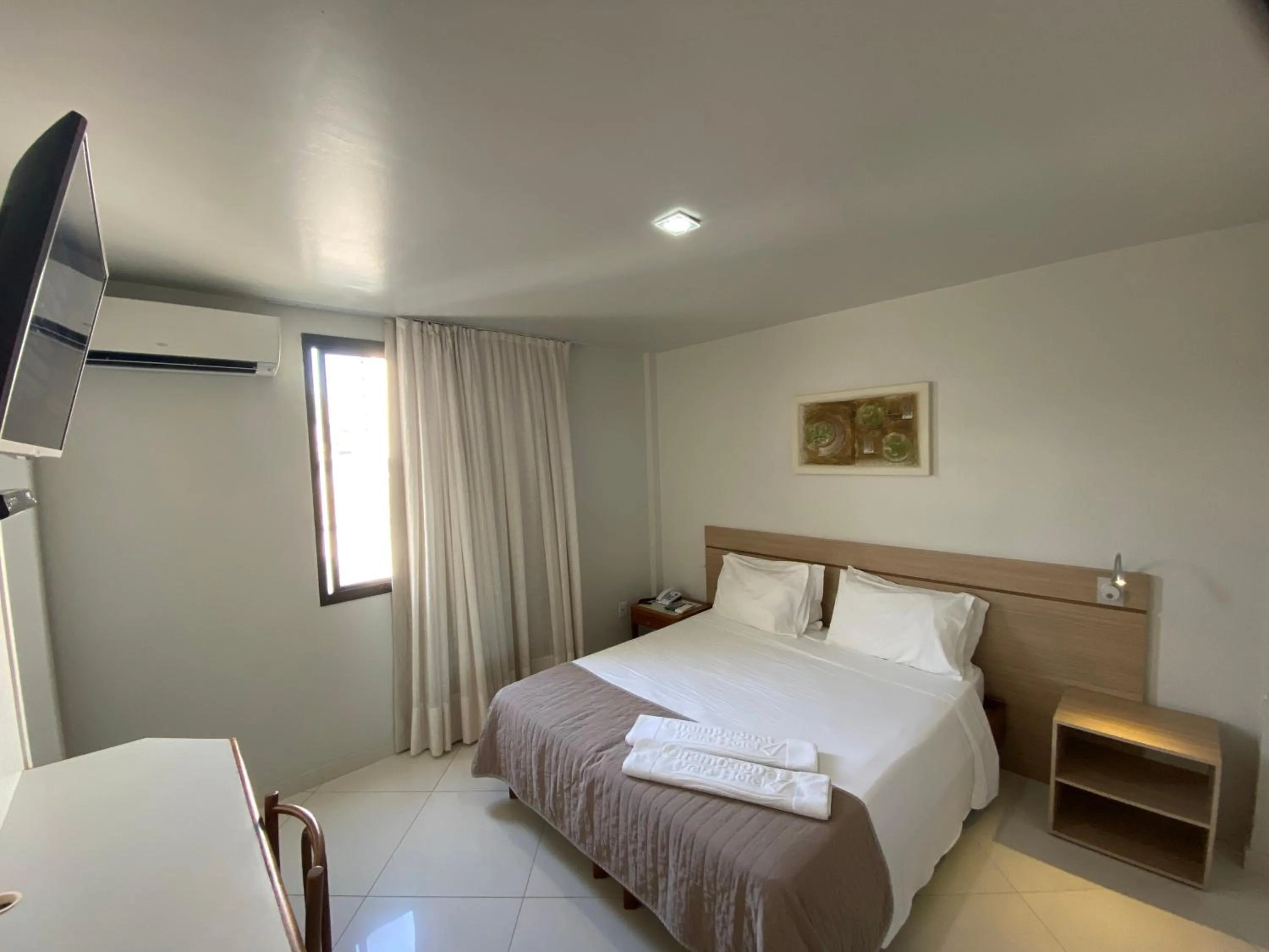 Bedroom, Bed in Champagnat Praia Hotel