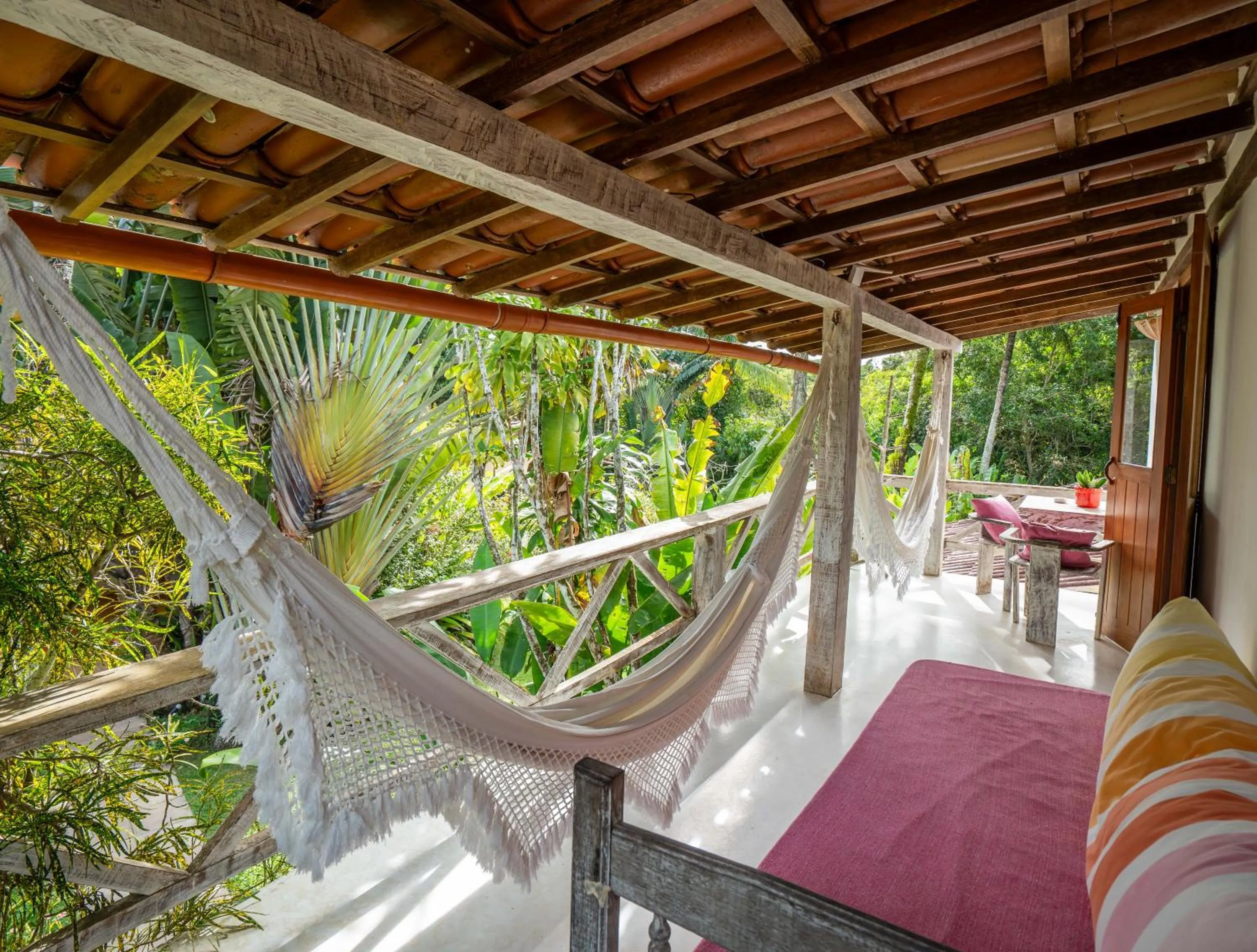 Balcony/Terrace, Bed in Pousada Jardim Das Margaridas