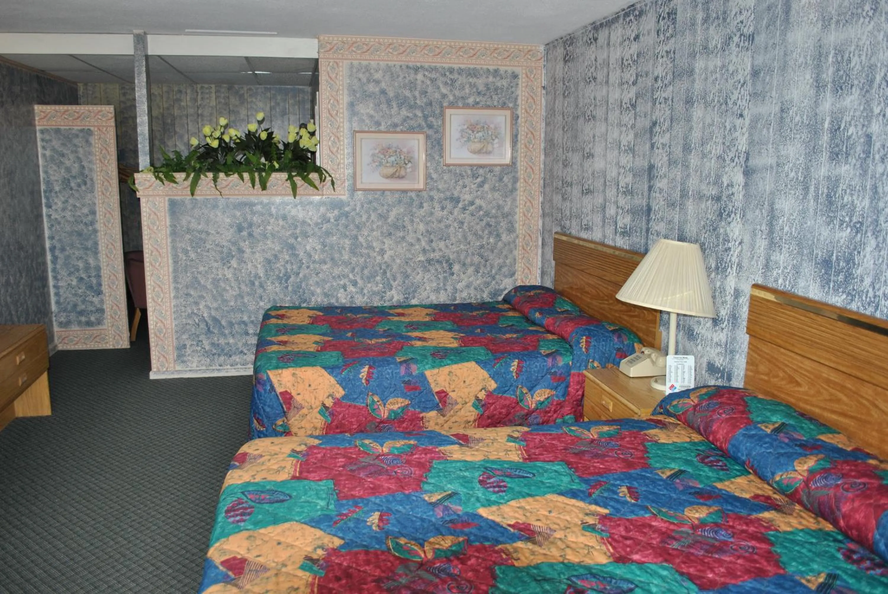 Bed in Travel Inn Motel Michigan City