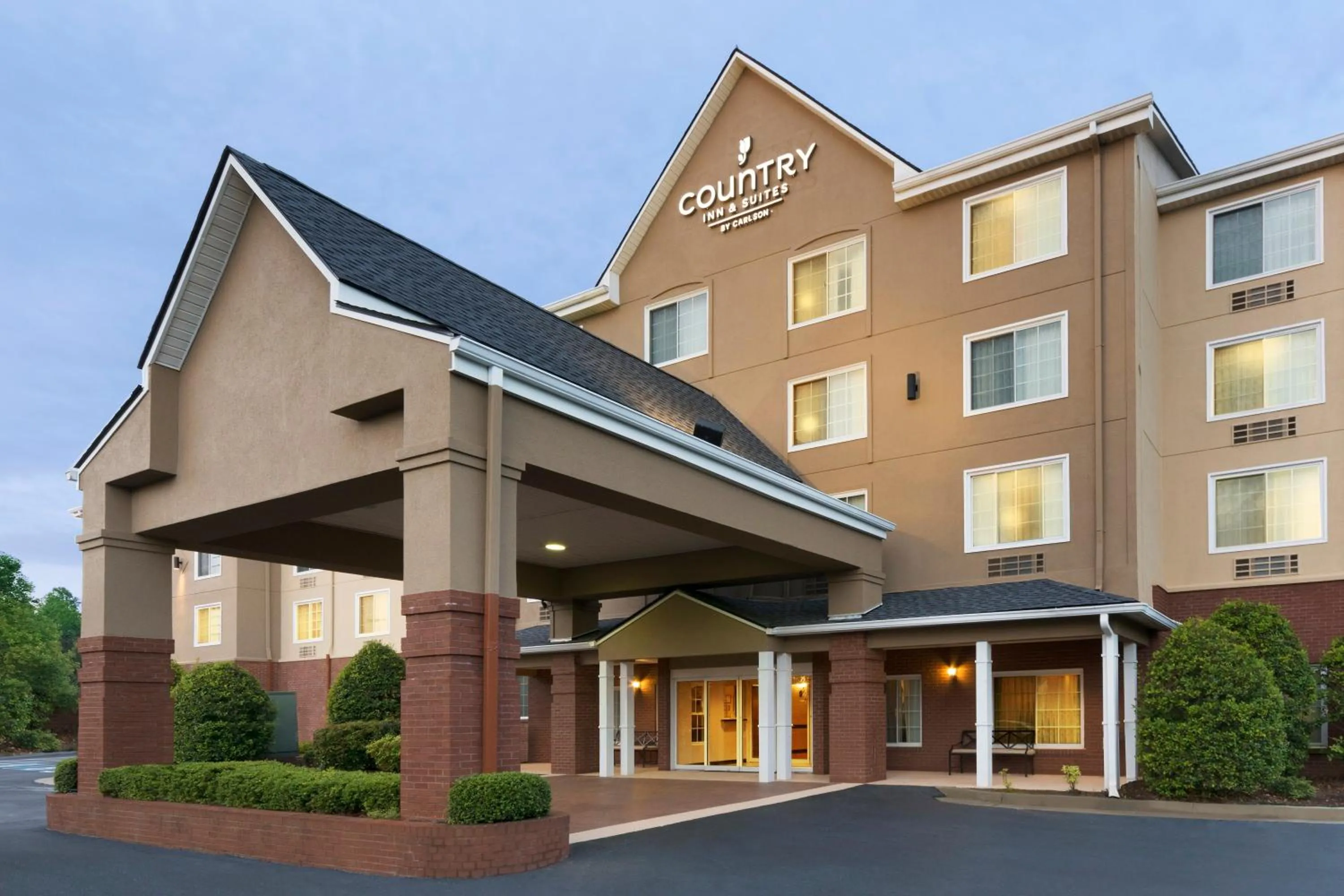 Property building in Country Inn & Suites by Radisson, Buford at Mall of Georgia, GA