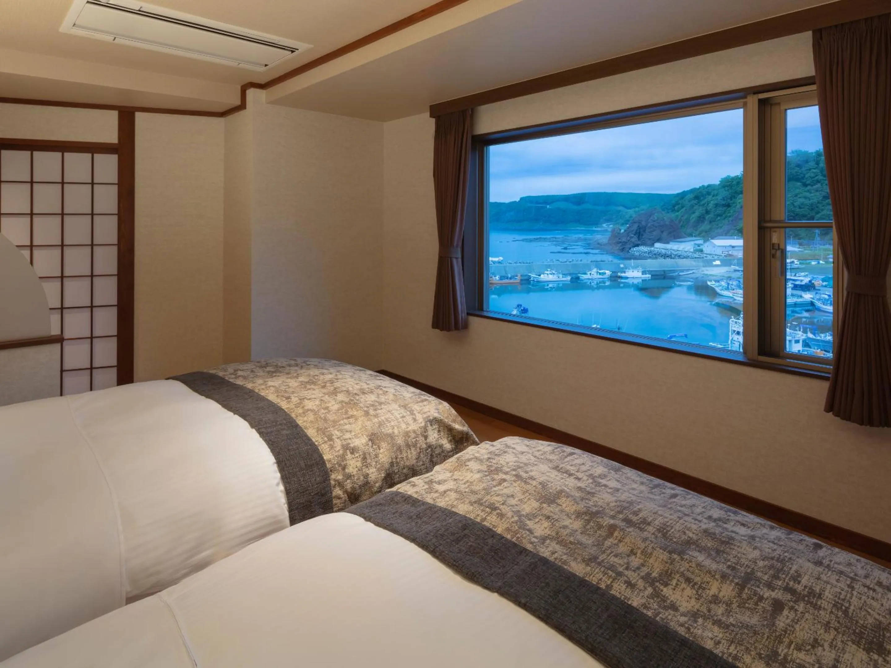Bedroom, Bed in Kitakobushi Shiretoko Hotel & Resort