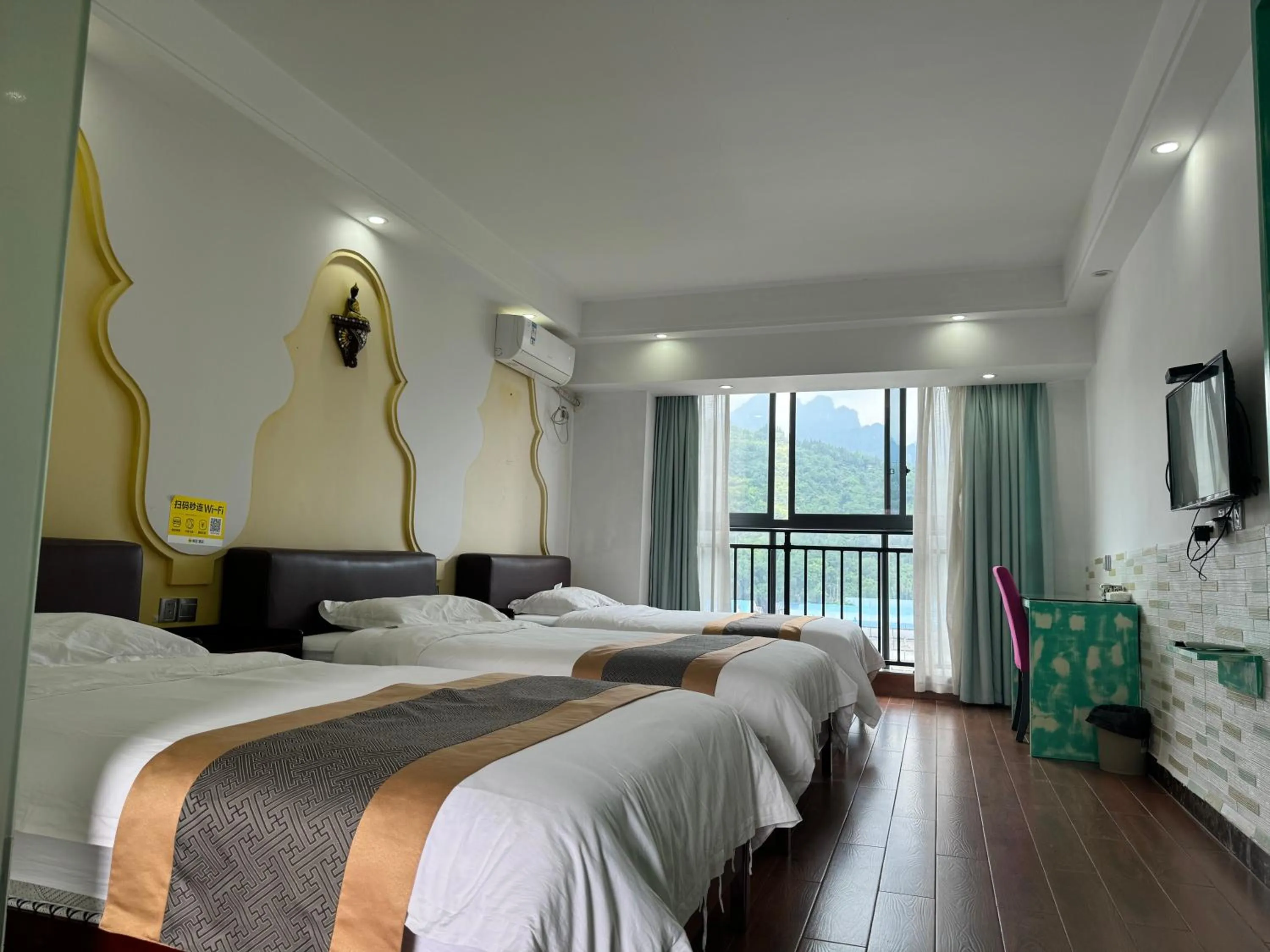 Photo of the whole room, Bed in Zhangjiajie Cat Theme Inn