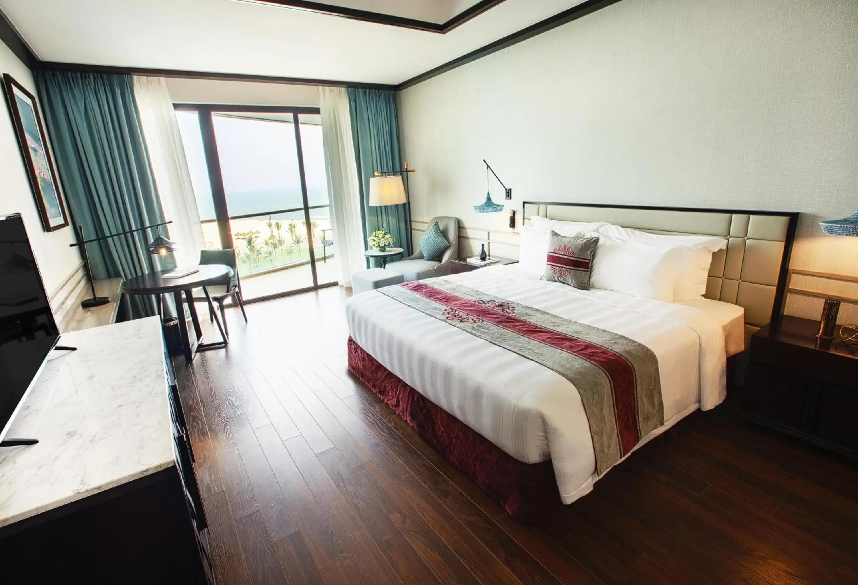 Deluxe Double Room with Balcony and Ocean View in Vinpearl Resort & Golf Nam Hoi An Deluxe Double Room with Balcony and Ocean View in Vinpearl Resort & Golf Nam Hoi An