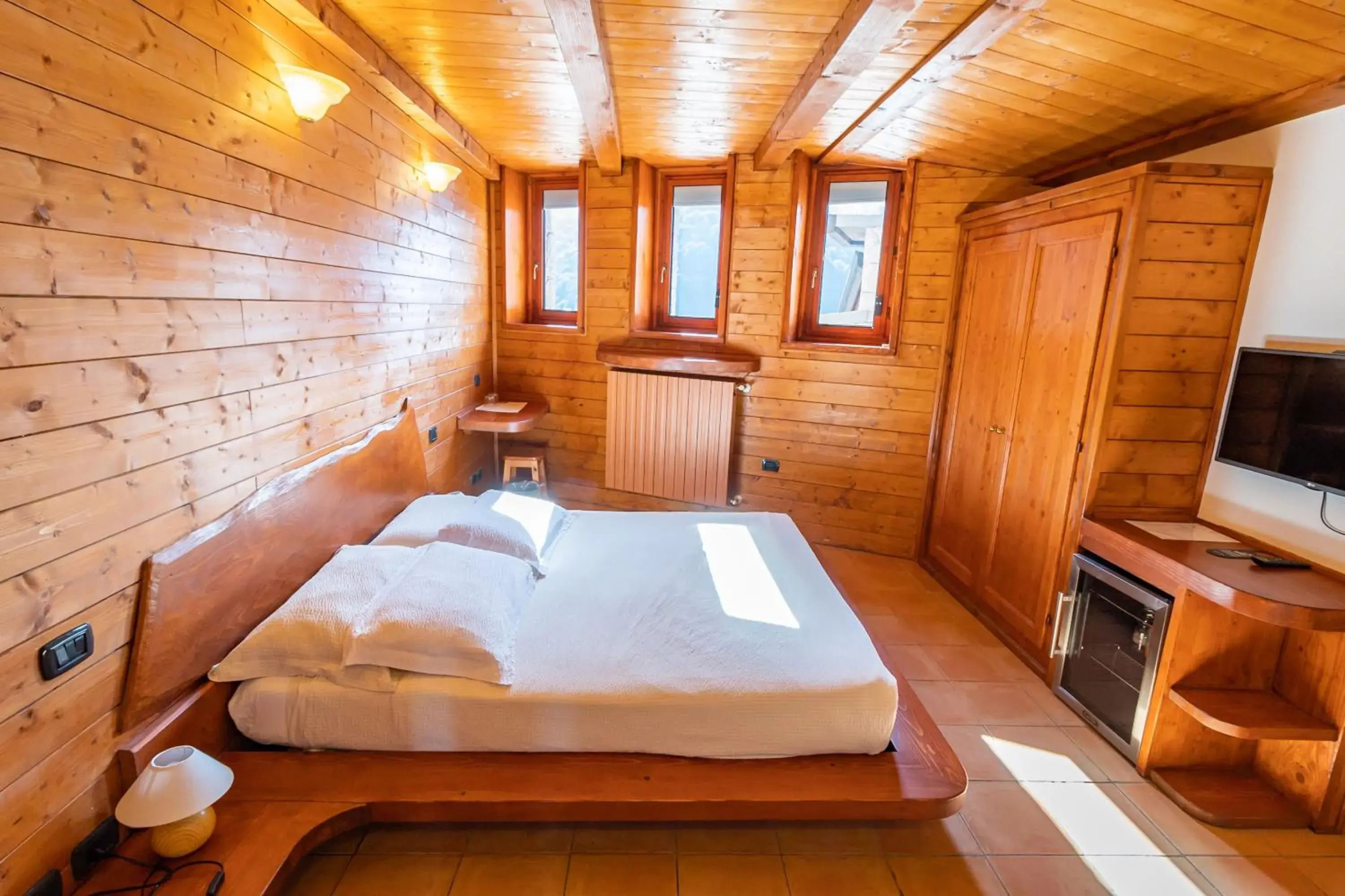 Deluxe Triple Room - Spa Access included in Resort Ninfea San Pellegrino Terme Deluxe Triple Room - Spa Access included in Resort Ninfea San Pellegrino Terme